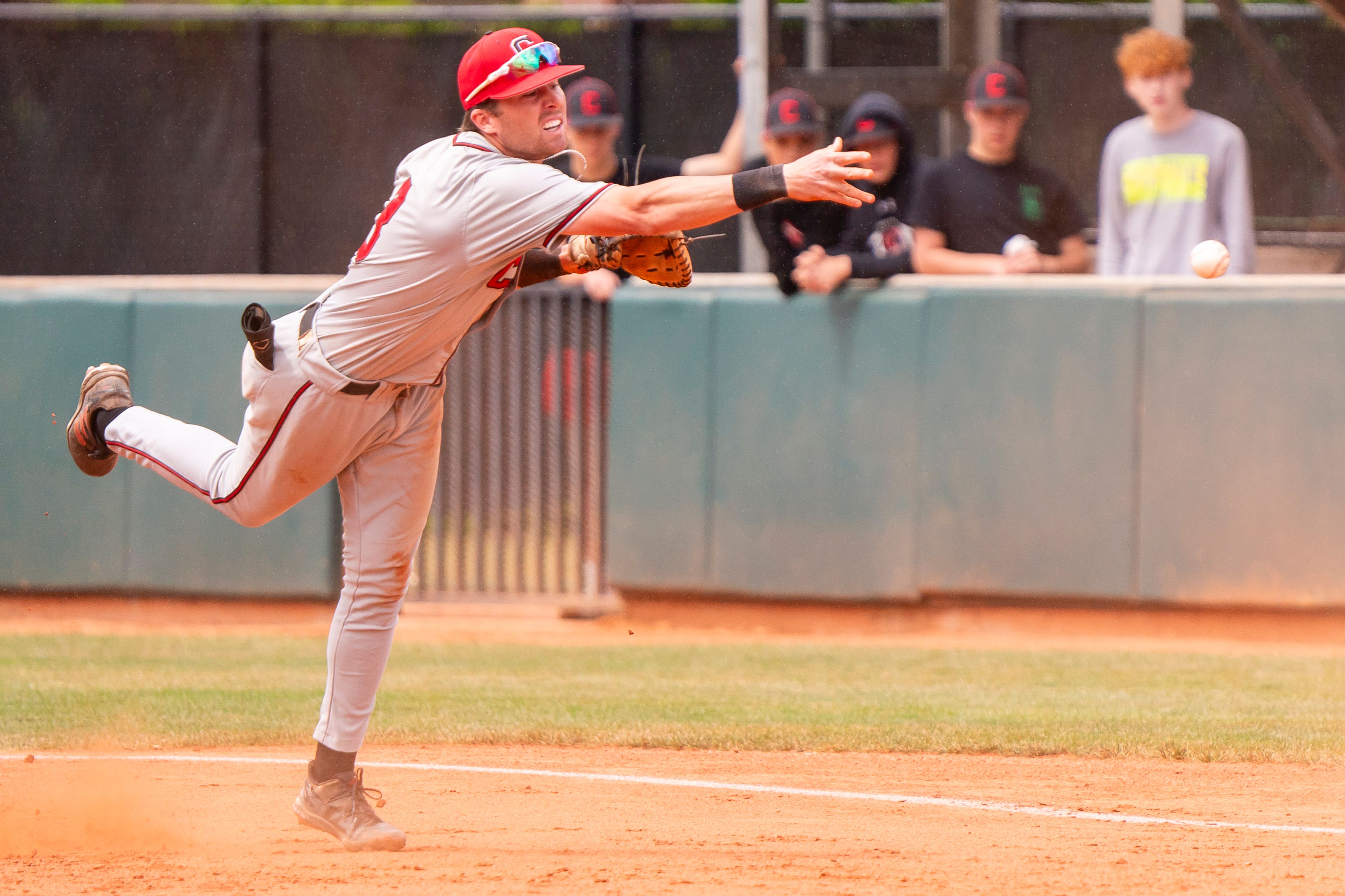 William Carey first baseman Jake Lycette throws the ball during game 6 of the NAIA World Series against Cumberlands on Saturday at Harris Field in Lewiston.