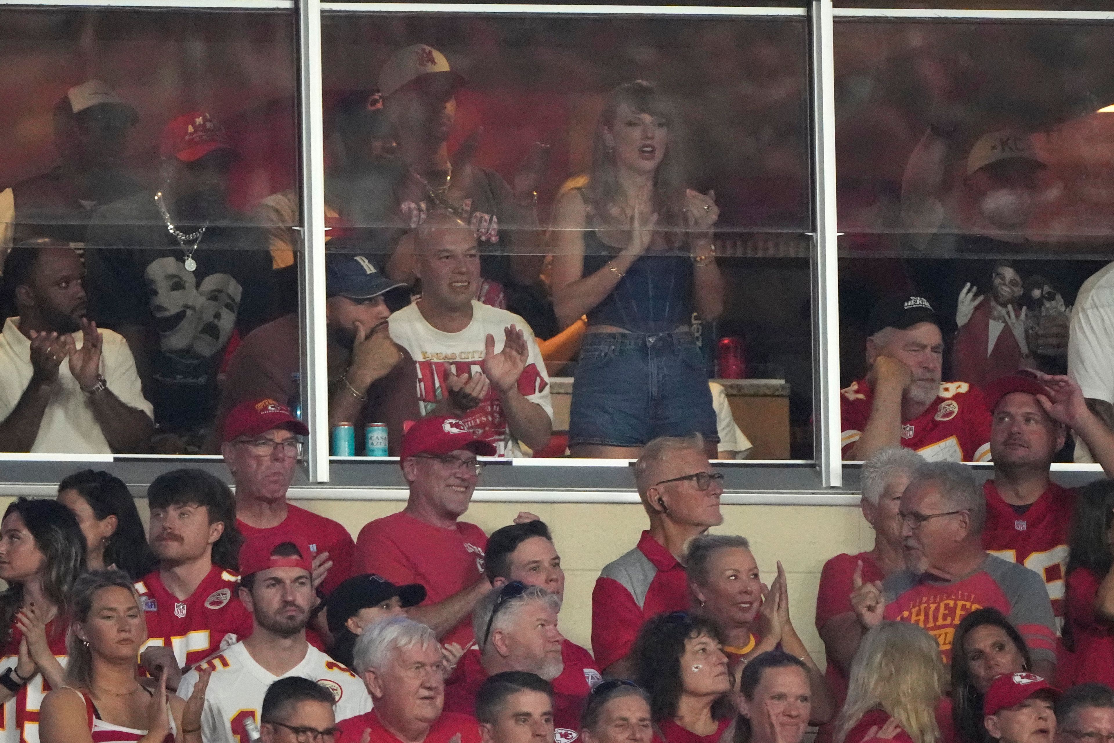 Taylor Swift is seen in a suite during the first half of an NFL football game between the Kansas City Chiefs and the Baltimore Ravens Thursday, Sept. 5, 2024, in Kansas City, Mo.