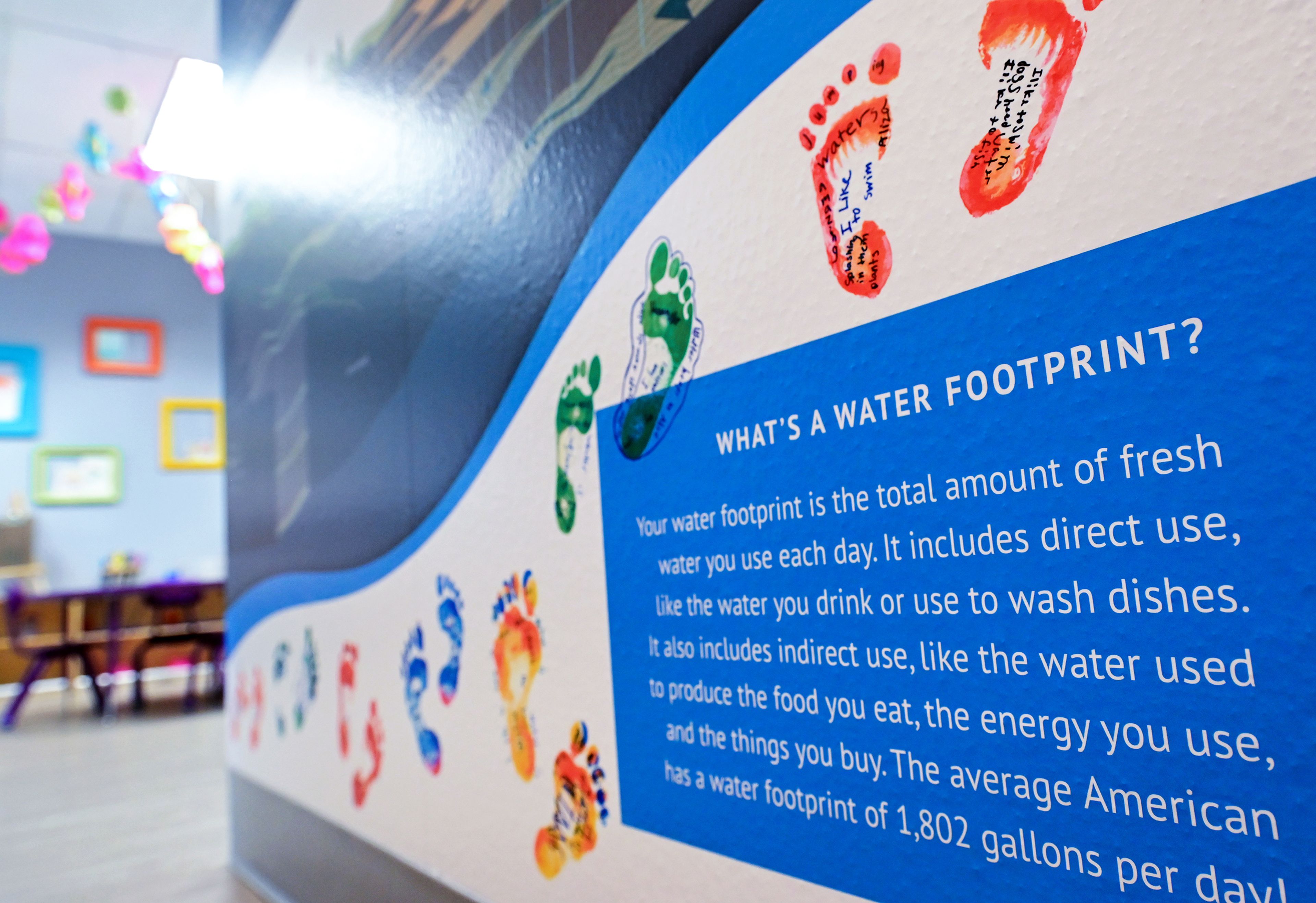 A new display educating visitors on the importance of water systems and conservation fills walls near the bathrooms and water bottle-filling station at the Palouse Discovery Science Center on Wednesday in Pullman.