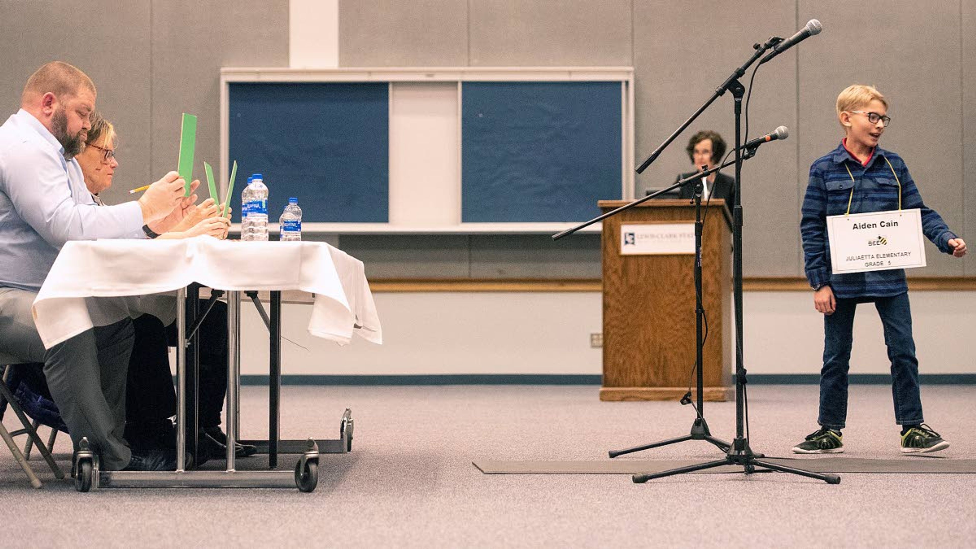 Aiden Cain, a fifth grader at Juliaetta Elementary, joyfully walks back to his seat after correctly spelling a word in the 34th Annual Inland Northwest Regional Spelling Bee on Saturday in Lewiston. Cain finished the contest in second place.