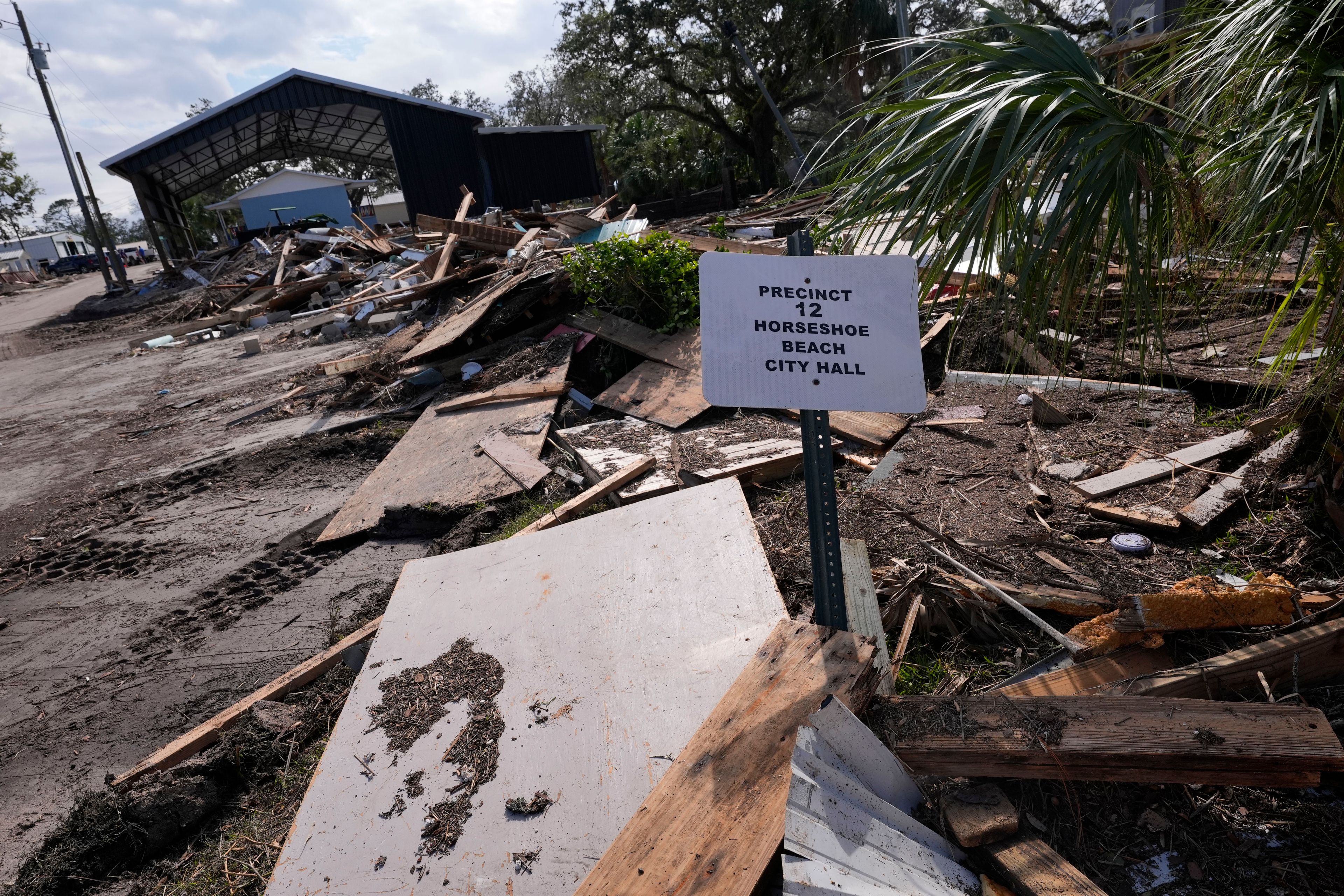 The ruins of city hall are seen in the aftermath of Hurricane Helene, in Horseshoe Beach, Fla., Saturday, Sept. 28, 2024. (AP Photo/Gerald Herbert)