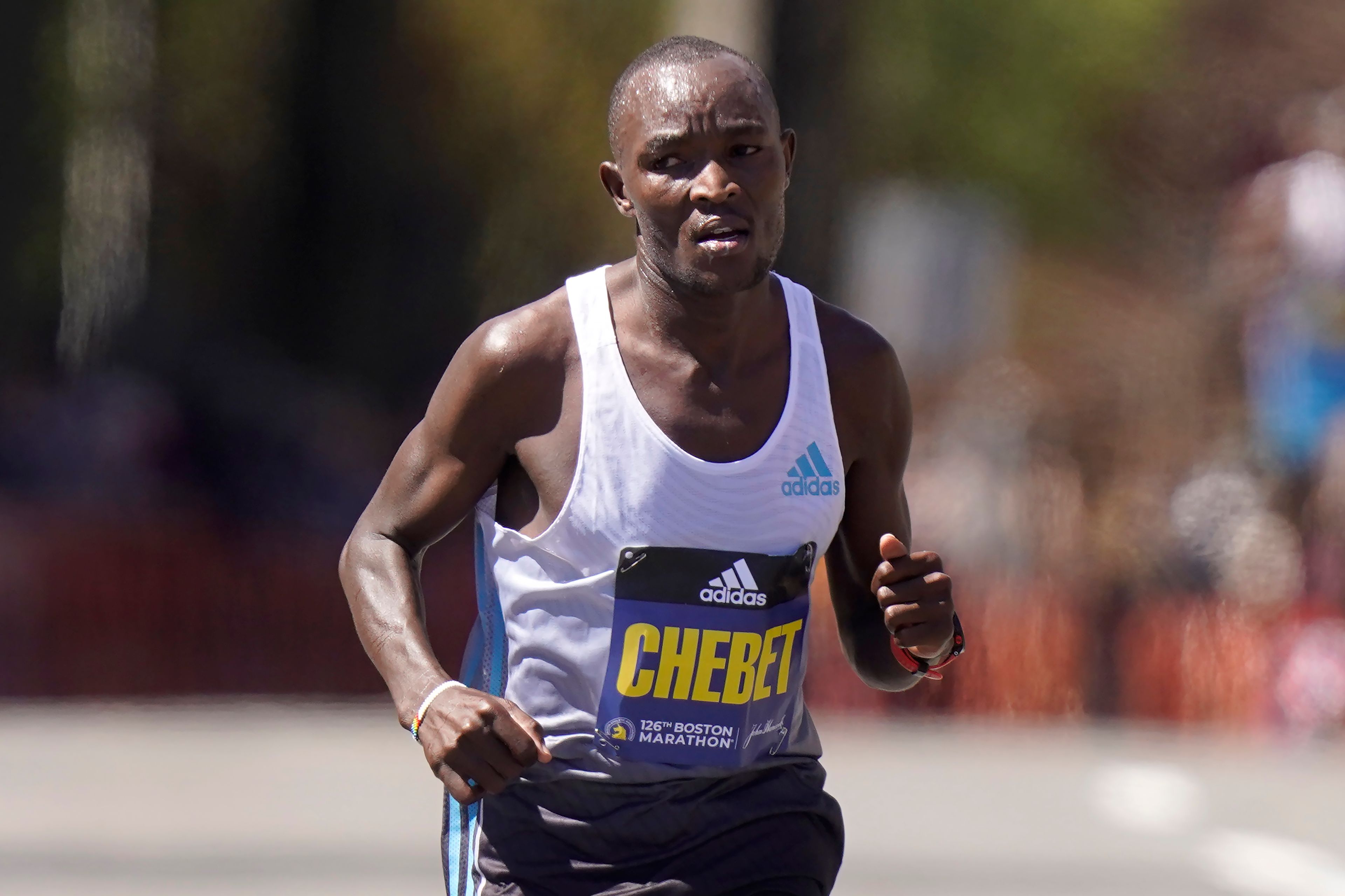 Evans Chebet, of Kenya, runs while leading the Boston Marathon, Monday, April 18, 2022, in Brookline, Mass. Chebet went on to win the men's division of the 126th edition of the race. (AP Photo/Steven Senne)