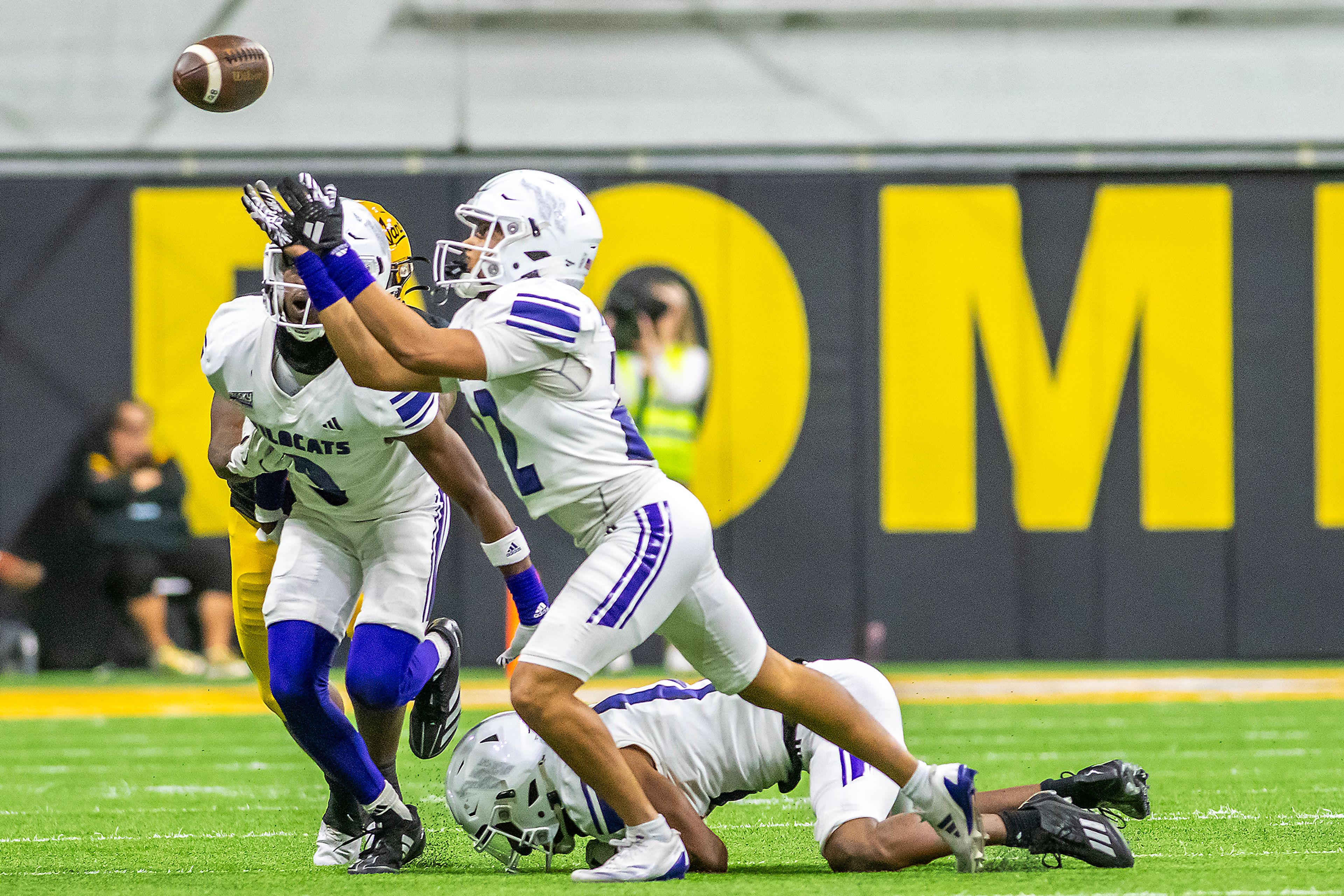 Weber State cornerback Ishaan Daniels catches a pass broken up by his teammate for an interception against against the Idaho during a quarter of a Big Sky conference game Saturday at the P1FCU Kibbie Dome in Moscow.