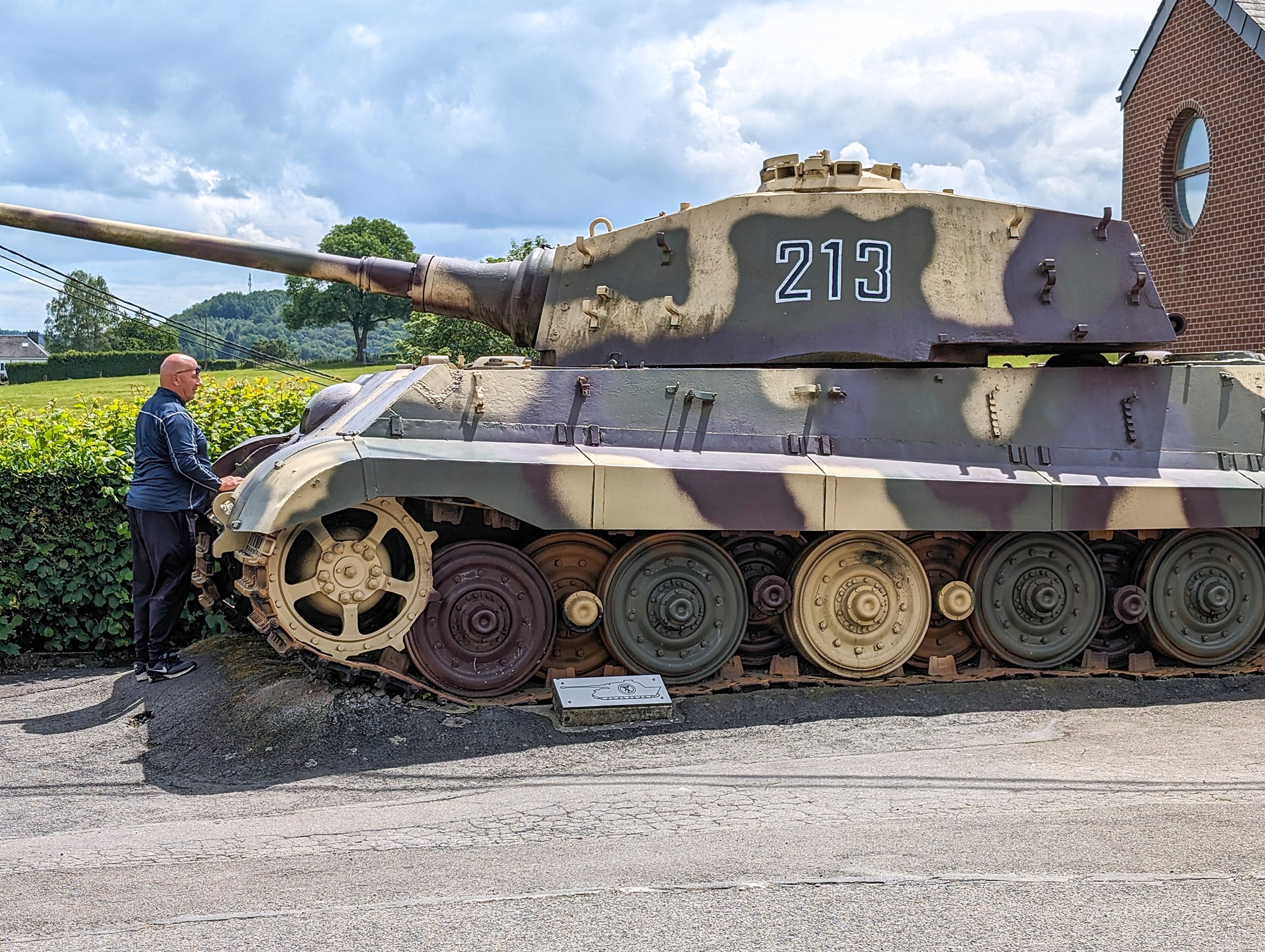 Mike Kramer looks over a German Tiger tank in La Gleize, Belgium.