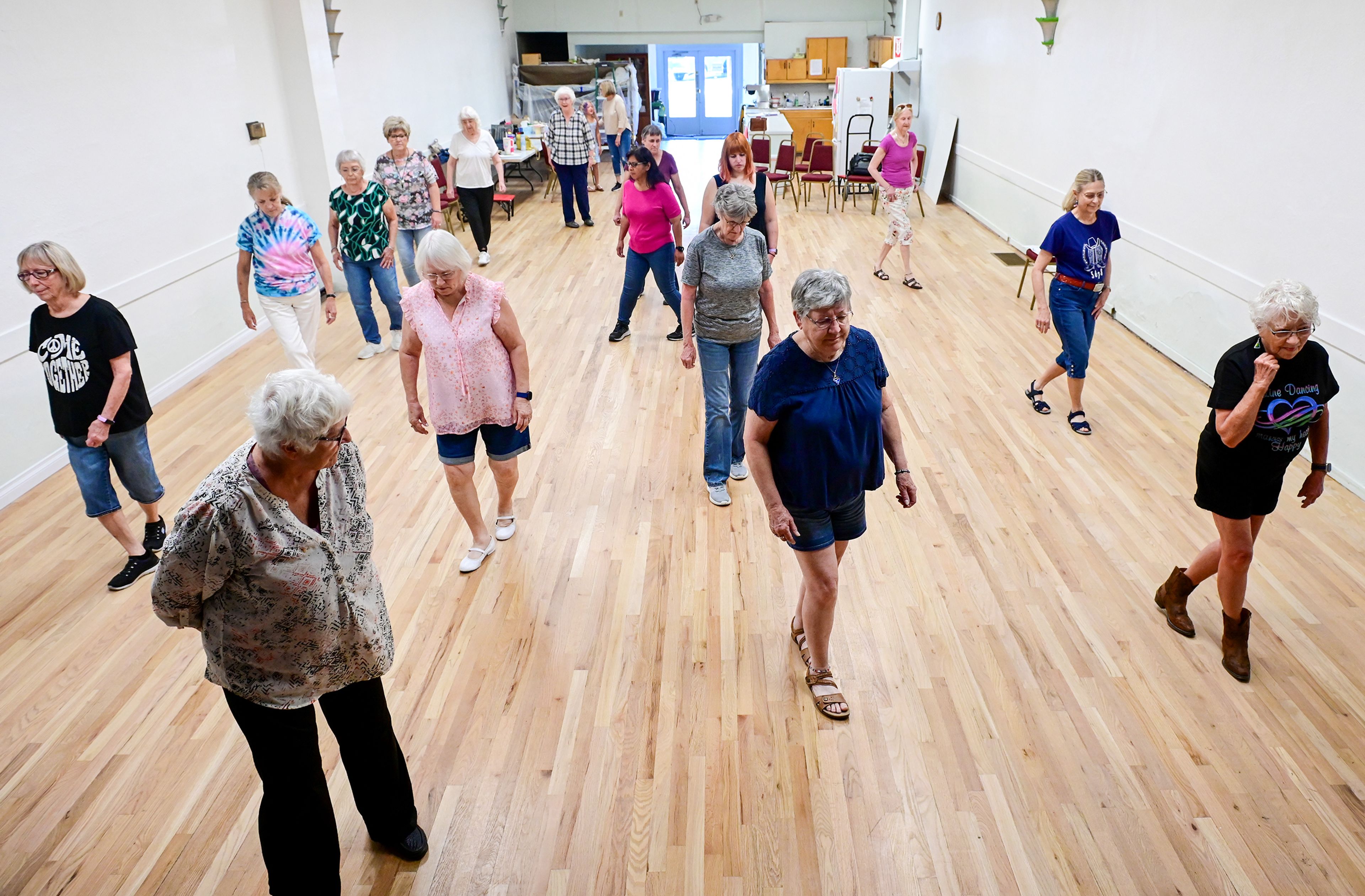 Line dancers fill the floor of the Sixth Street Senior Center, a weekly event at the center in Clarkston.