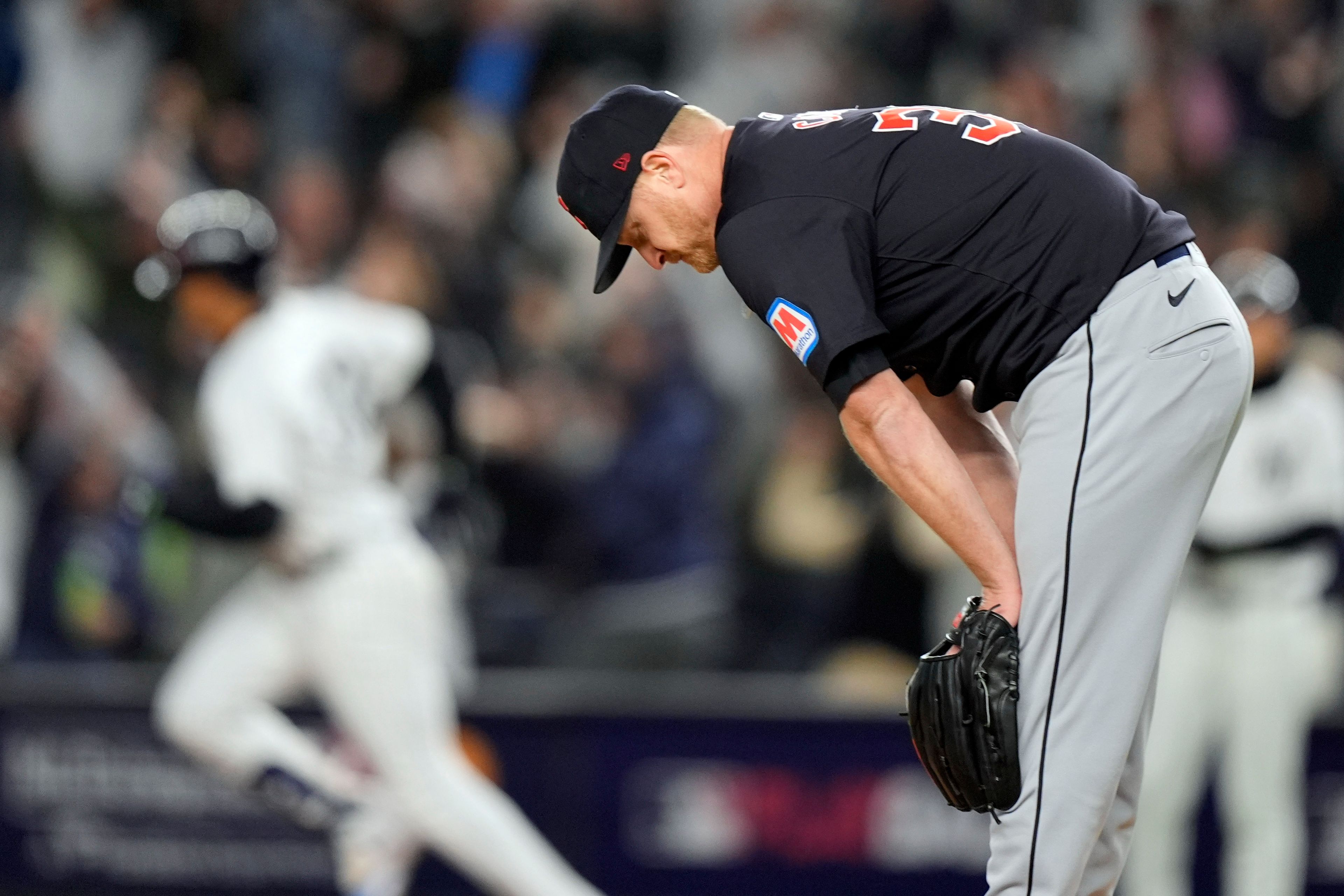 Cleveland Guardians starting pitcher Alex Cobb reacts after giving up a home run to New York Yankees' Juan Soto during the third inning in Game 1 of the baseball AL Championship Series Monday, Oct. 14, 2024, in New York. (AP Photo/Frank Franklin II)