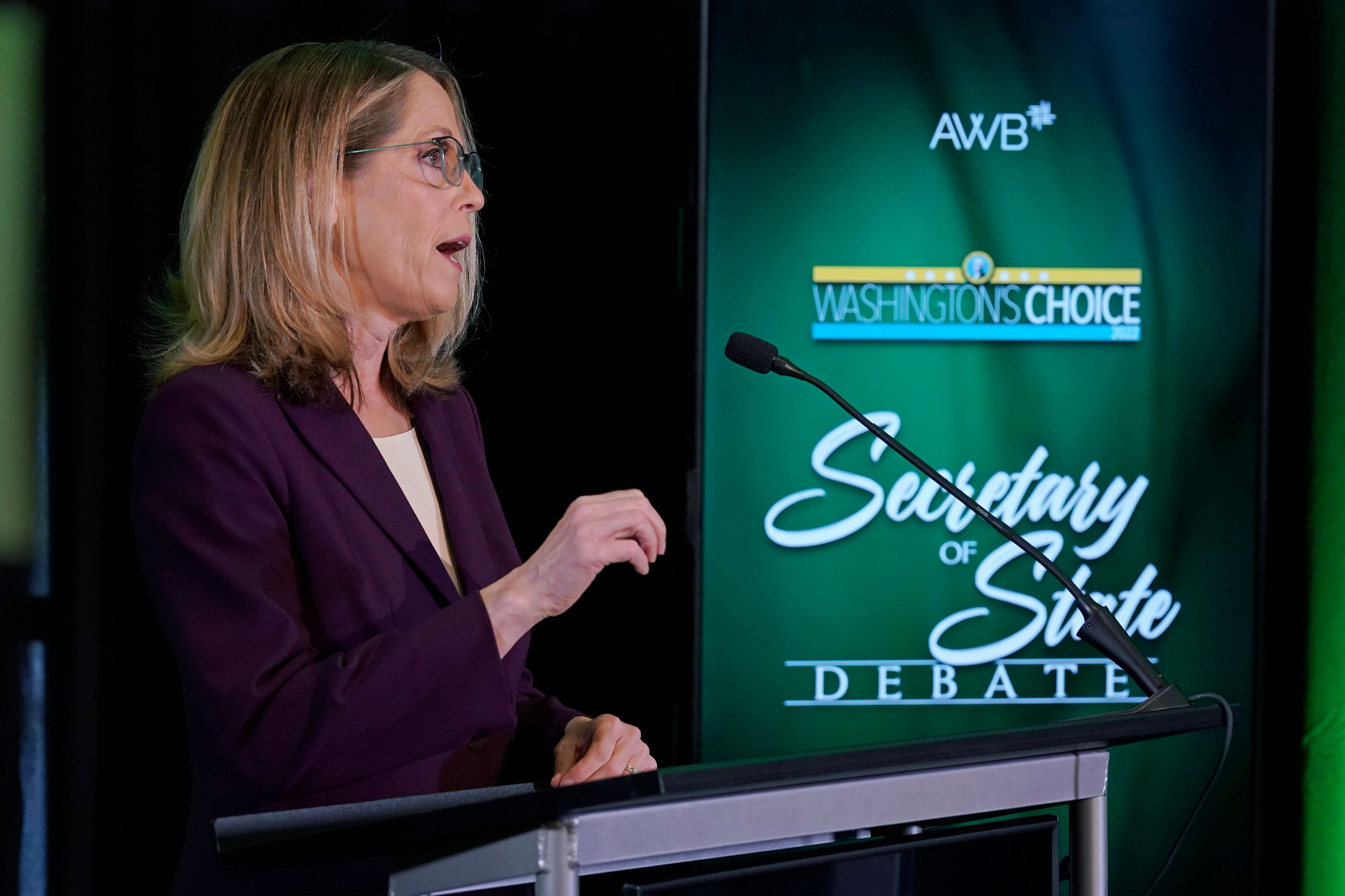 Pierce County Auditor Julie Anderson, who is running as a nonpartisan, takes part in a debate with Washington Secretary of State Steve Hobbs, a Democrat, Wednesday, Aug. 17, 2022, in Olympia, Wash. Hobbs and Anderson are seeking to fill the remaining two years of the term of Republican Secretary of State Kim Wyman, who left to take a key election security job in the Biden administration. (AP Photo/Ted S. Warren)