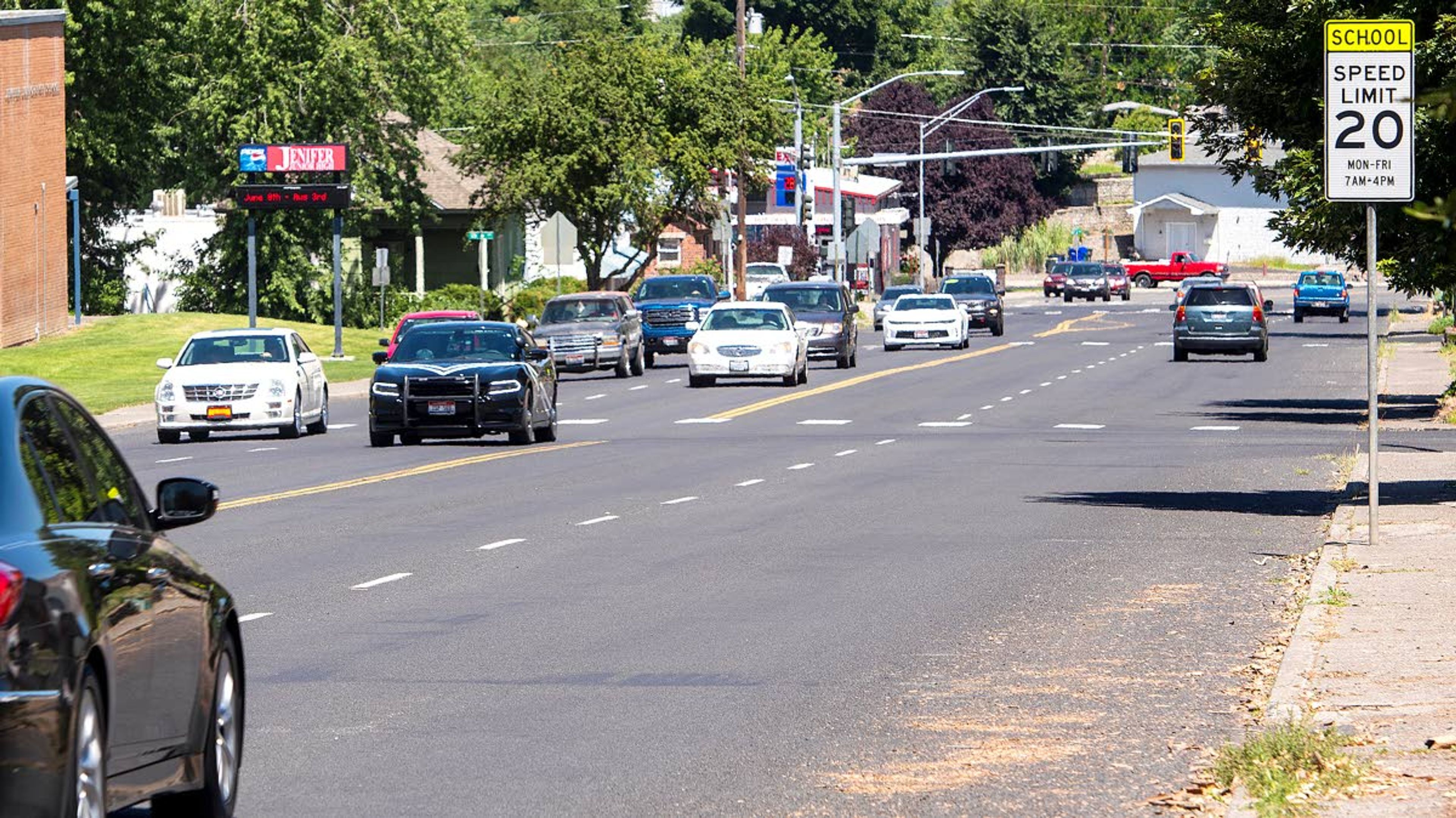 Tribune/Pete CasterA sign notifies drivers to slow down as traffic moves north and south on 17th Street past Jenifer Junior High School in Lewiston.