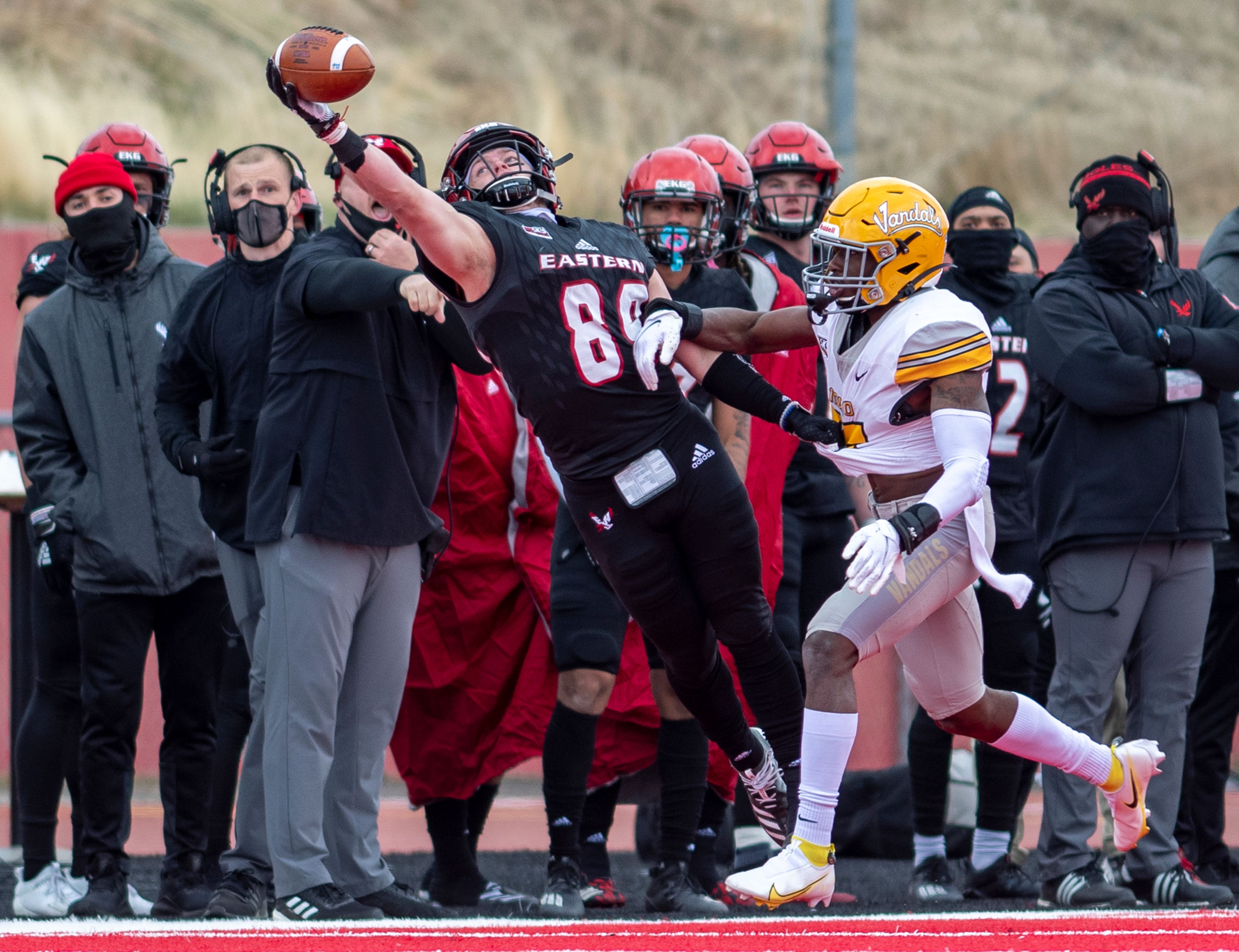 Eastern Washington wide receiver Efton Chism III (89) comes down with a one-handed catch over Idaho defensive back Jalen Hoover (25) during the third quarter of a Big Sky Conference matchup at Roos Field on Saturday afternoon. Eastern Washington defeated Idaho 38-31.