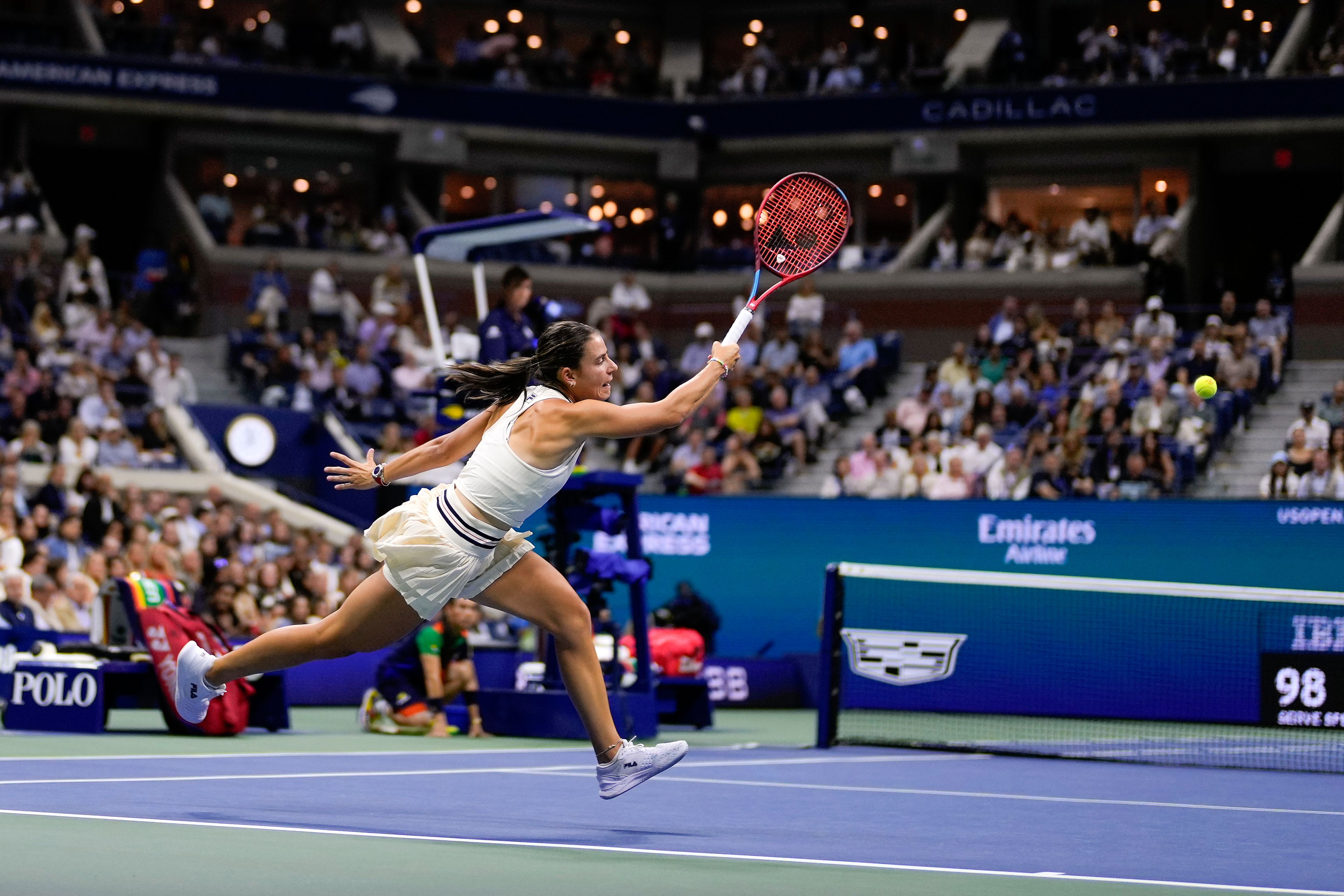 Emma Navarro, of the United States, returns a shot to Aryna Sabalenka, of Belarus, during the women's singles semifinals of the U.S. Open tennis championships, Thursday, Sept. 5, 2024, in New York.