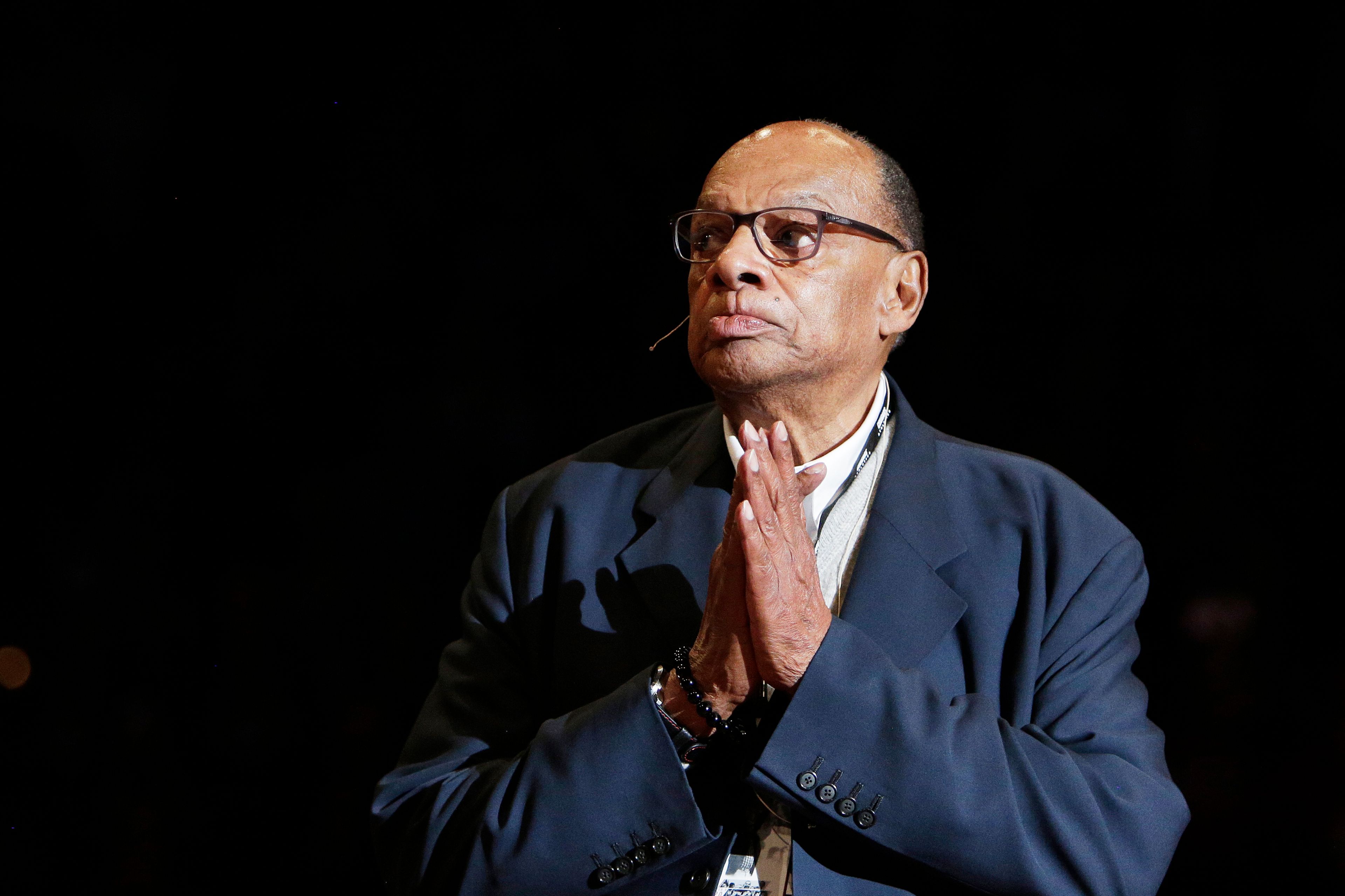 Former Washington State basketball head coach George Raveling looks on during the school's ceremony to honor him during halftime of an NCAA college basketball game between Washington State and Washington in Pullman, Wash., Sunday, Feb. 9, 2020. (AP Photo/Young Kwak)