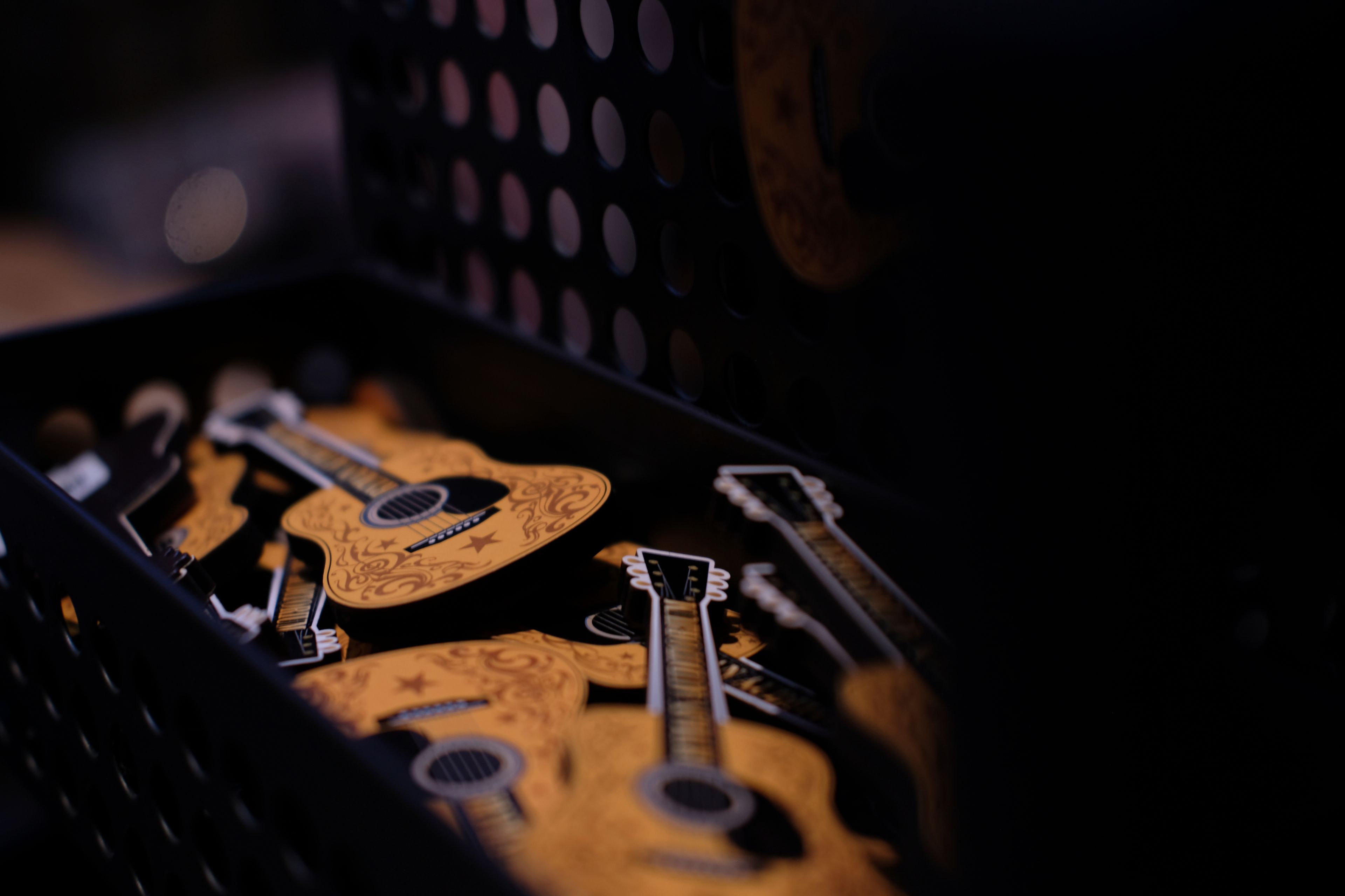 Guitar magnets are displayed at the Ryman Auditorium gift shop in Nashville, Tenn., on July 30, 2024.