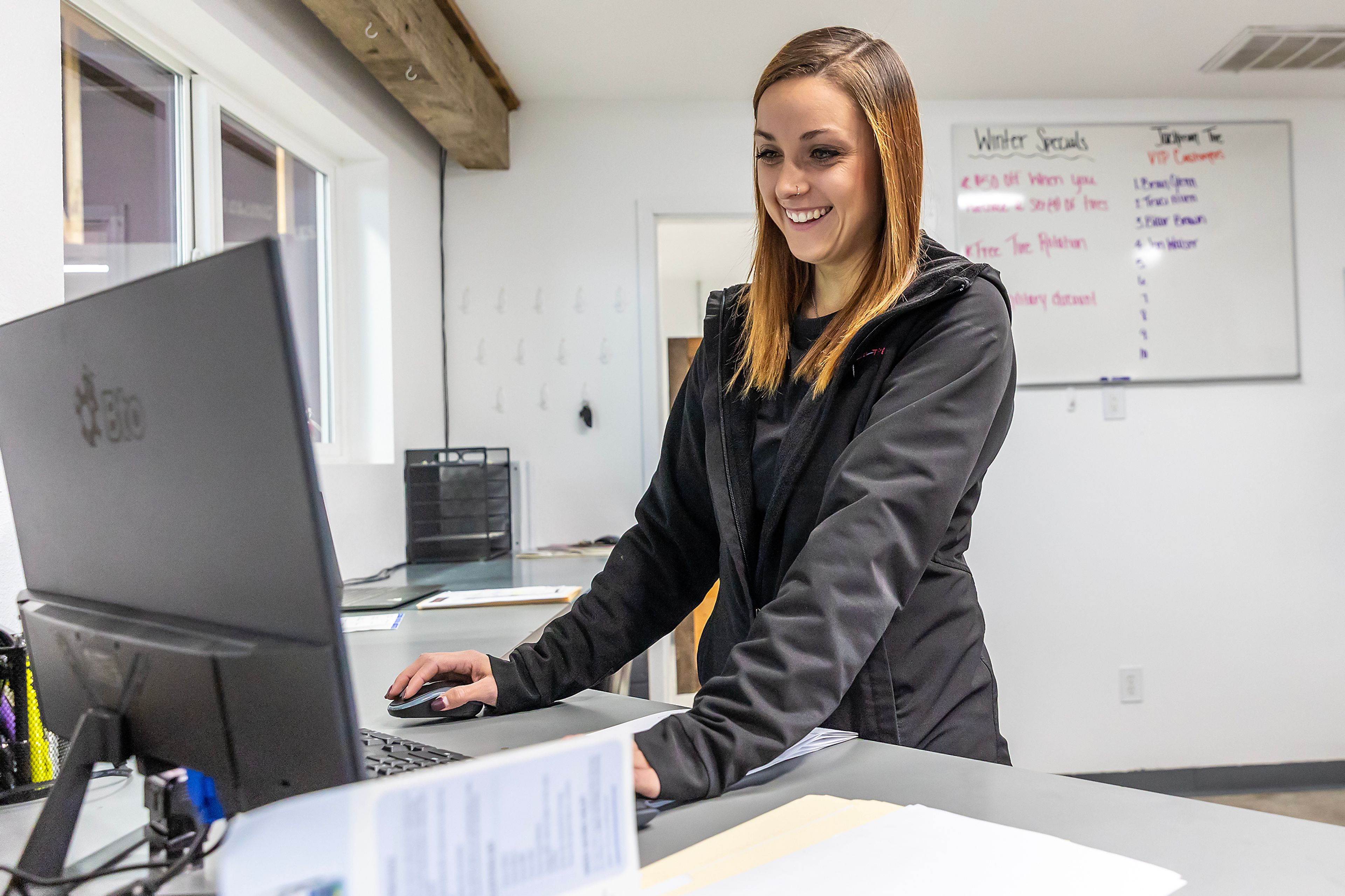 Meghan Garrett  works in the office side of Jackman Tire Thursday in the Lewiston Orchards.