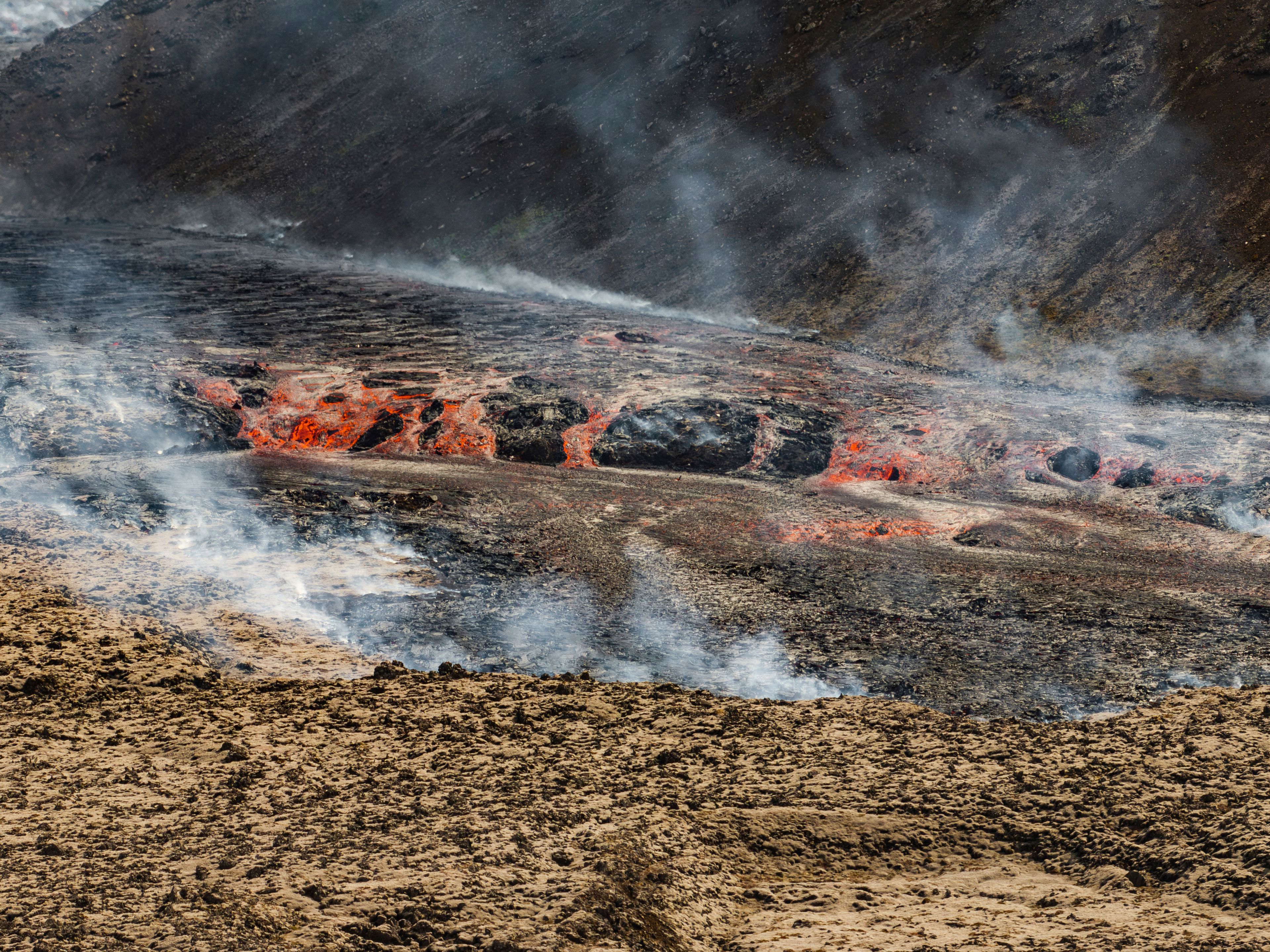 The lava flows from a volcano in Grindavik, Iceland, Wednesday, May 29, 2024. A volcano in southwestern Iceland erupted Wednesday for the fifth time since December, spewing red lava that once again threatened the coastal town of Grindavik and led to the evacuation of the popular Blue Lagoon geothermal spa.