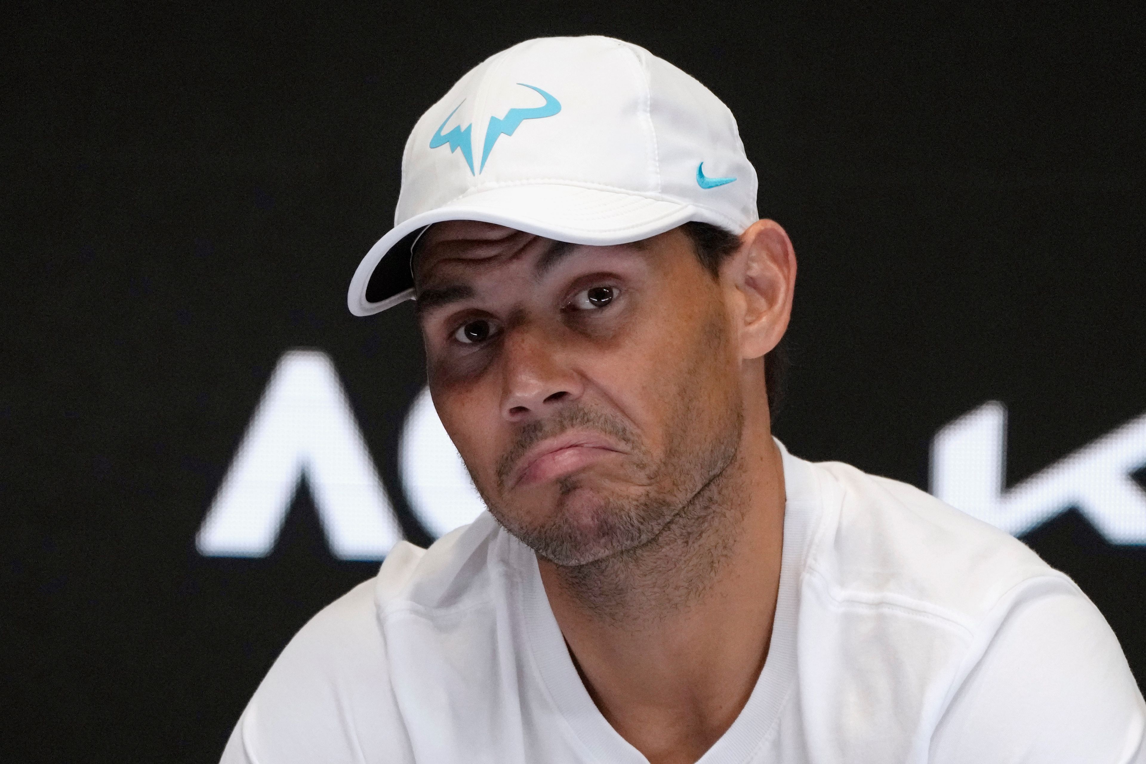 Rafael Nadal of Spain gestures during a press conference following his second round loss to Mackenzie McDonald of the U.S., at the Australian Open tennis championship in Melbourne, Australia, Wednesday, Jan. 18, 2023. (AP Photo/Mark Baker)