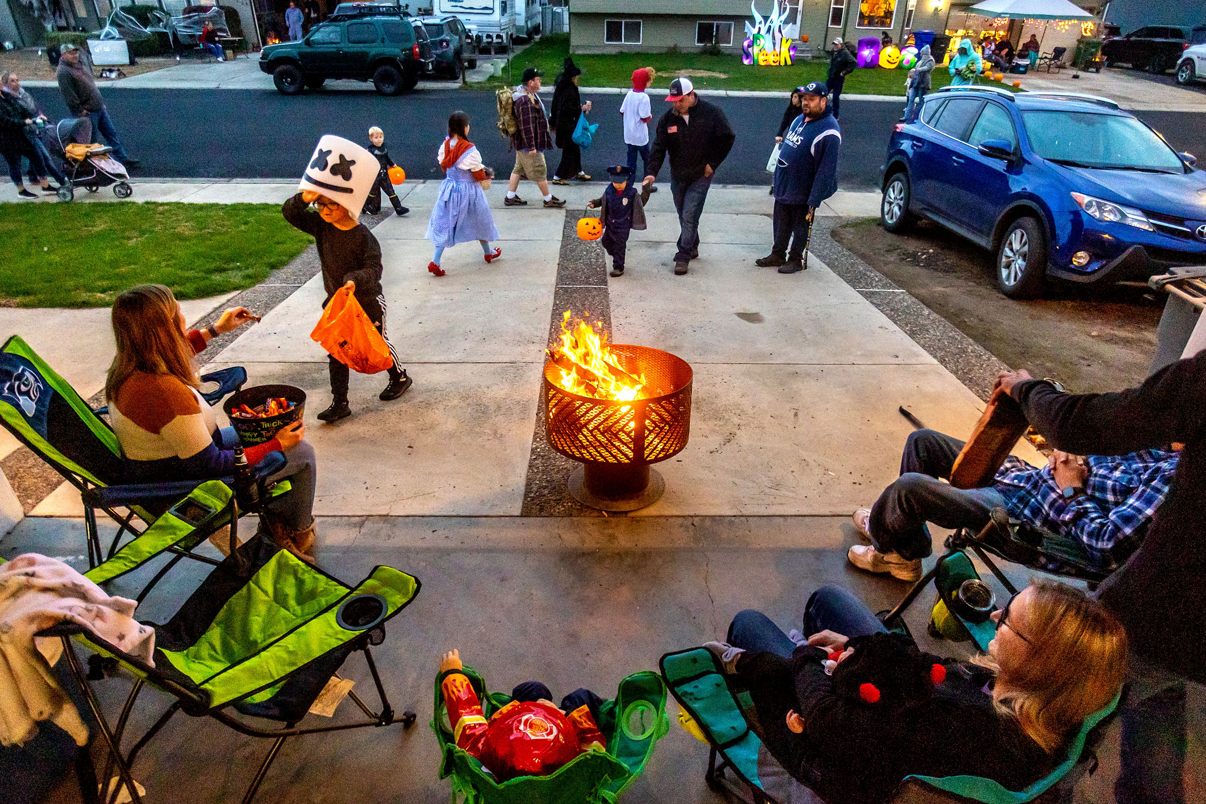 Kids trick-or-treat on Halloween at the Birch neighborhood in the Lewiston Orchards on Monday.