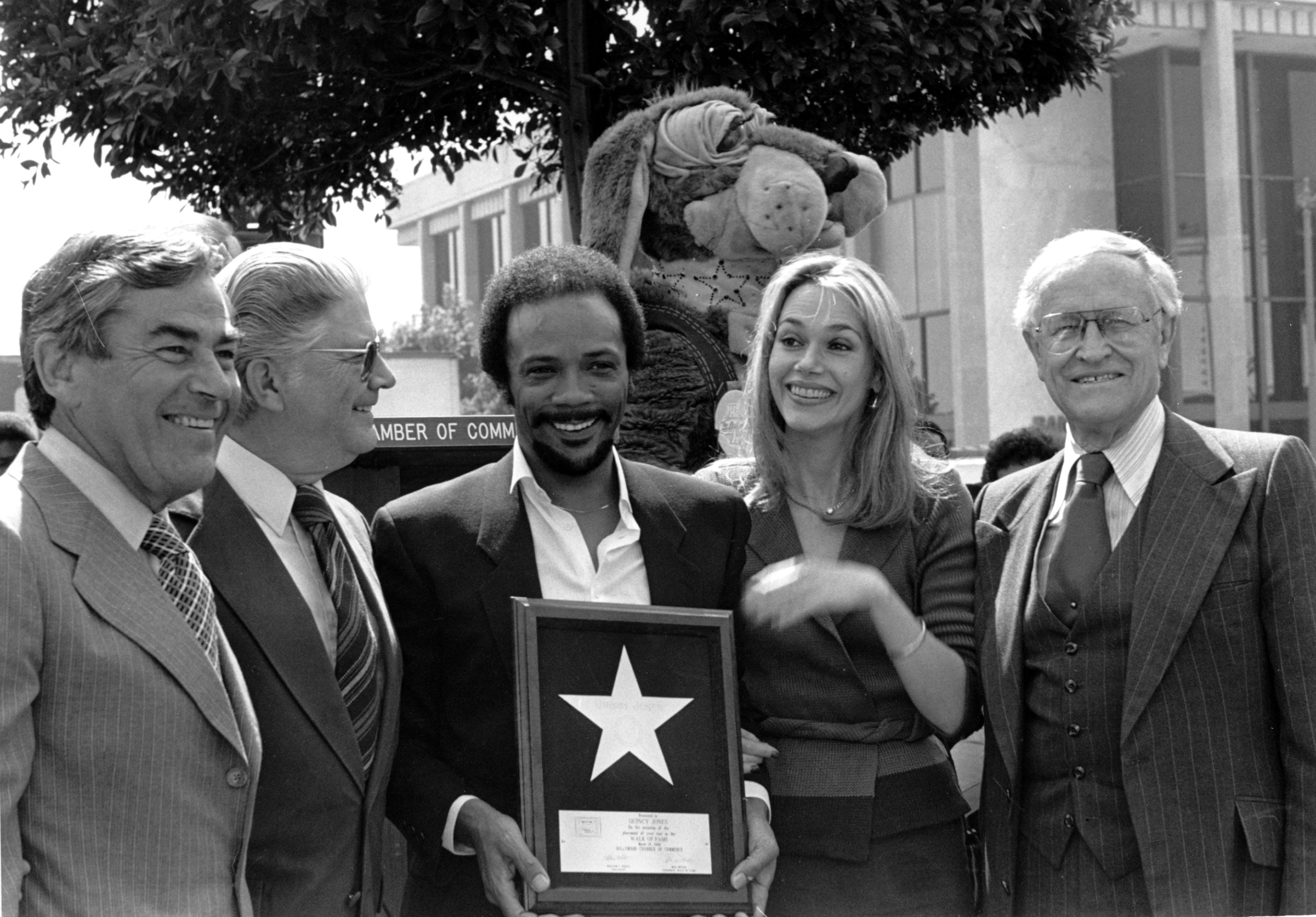 FILE - Musician Quincy Jones and his wife, actress Peggy Lipton, hold Jones' star which was placed in the Hollywood Walk of Fame in Los Angeles on March 14, 1980. (AP Photo/Barfield, File)