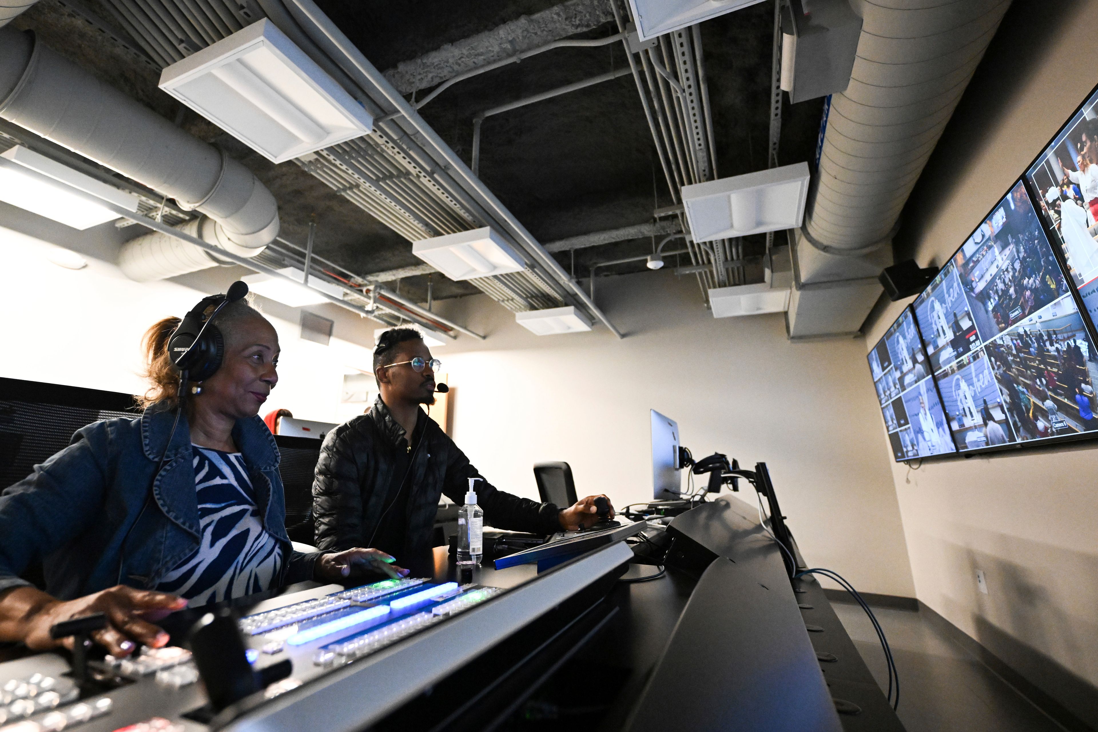 Members of the Kingdom Fellowship AME Church Audio Visual team work during church service, Sunday, June 2, 2024, in Calverton, Md. The suburban Maryland congregation, led by the Rev. Matthew L. Watley, has landed at the top of a list of the fastest-growing churches in America.