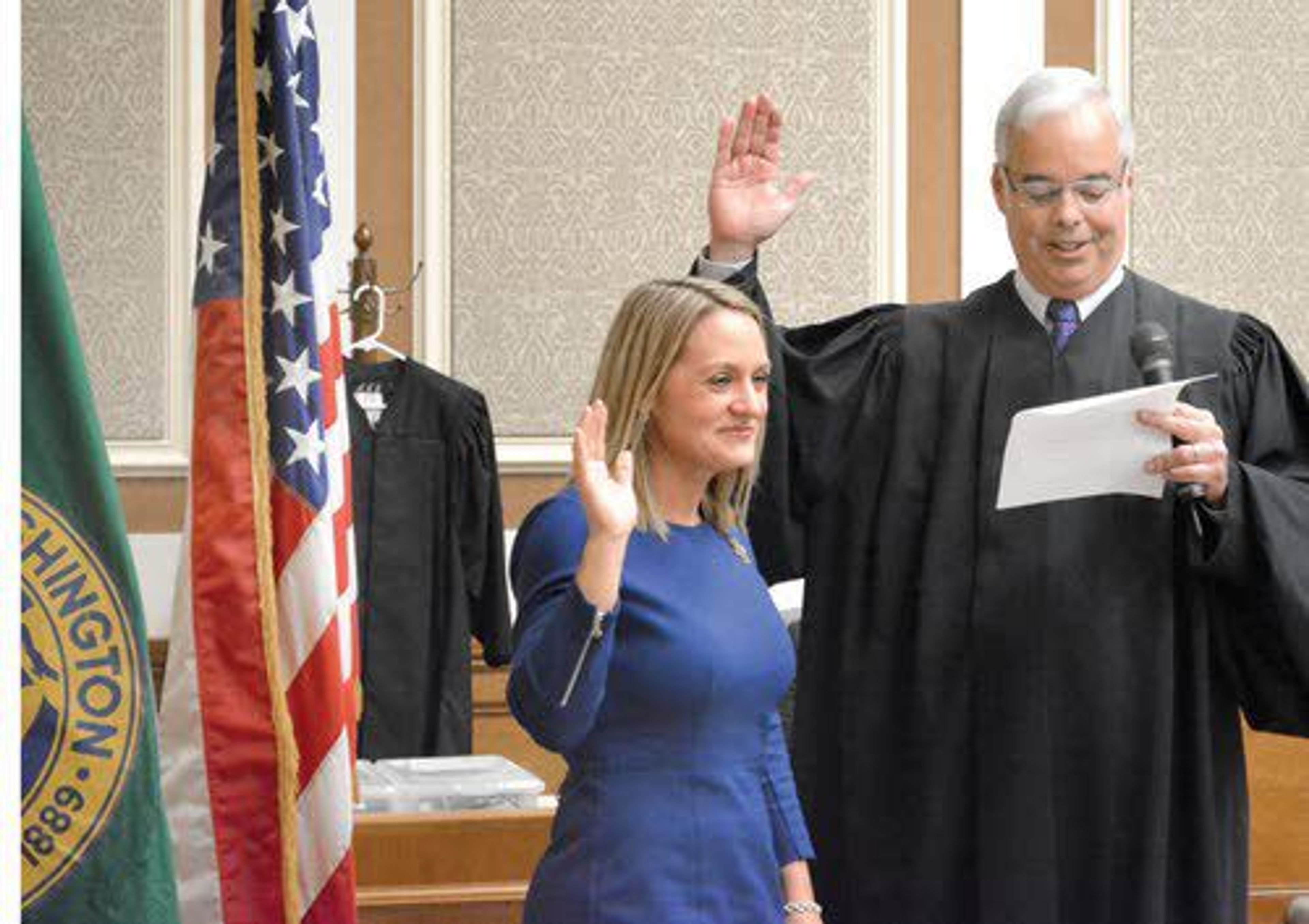 Judge Mary Dimke is sworn in by Judge Richard Tallman in January. Dimke, a former Clarkston resident, is a magistrate judge in the eastern Washington region.