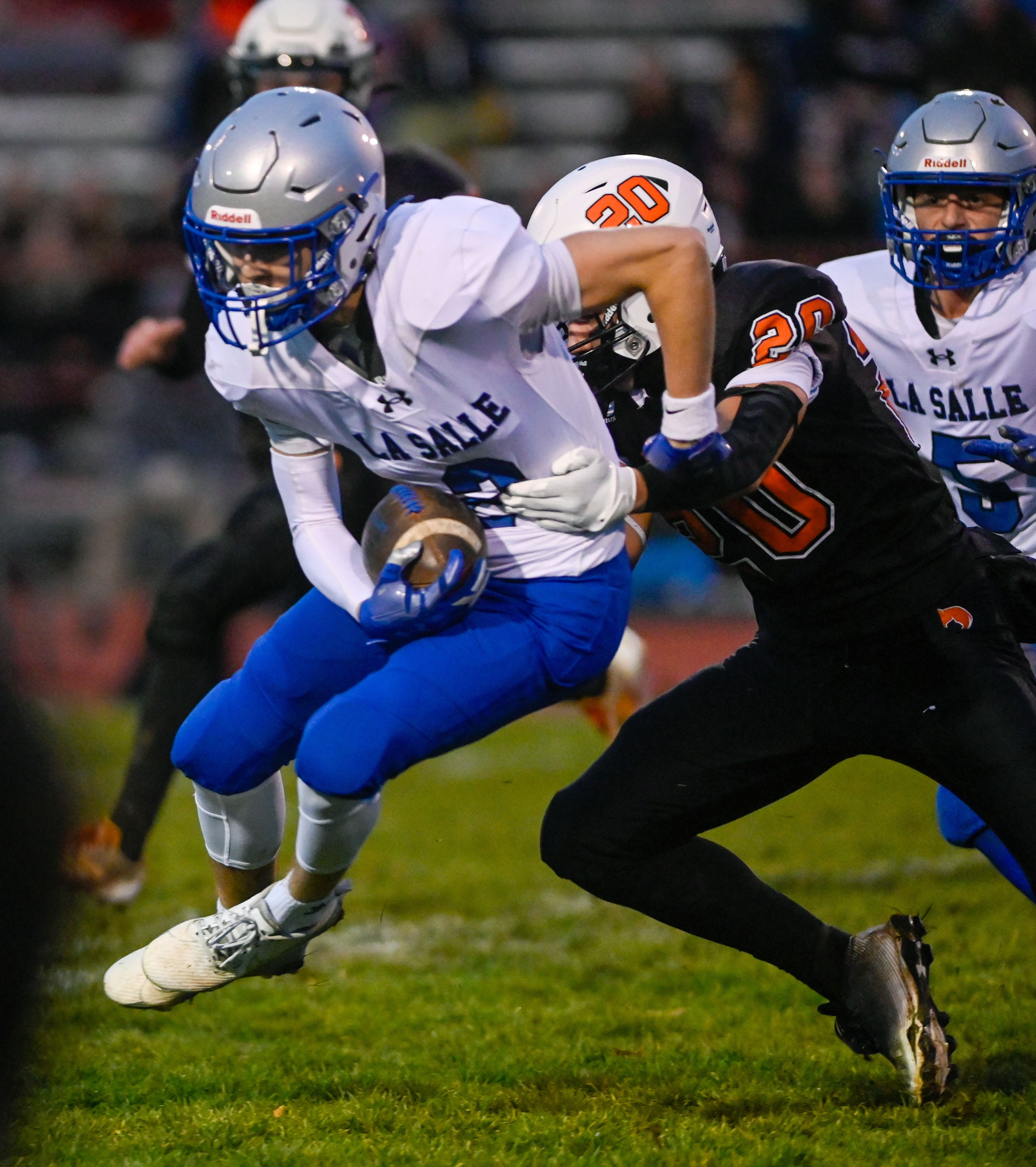 Asotin’s Morgan Bunch tackles La Salle’s Benji Dufault  Saturday during a Washington 2B state tournament game in Clarkston.