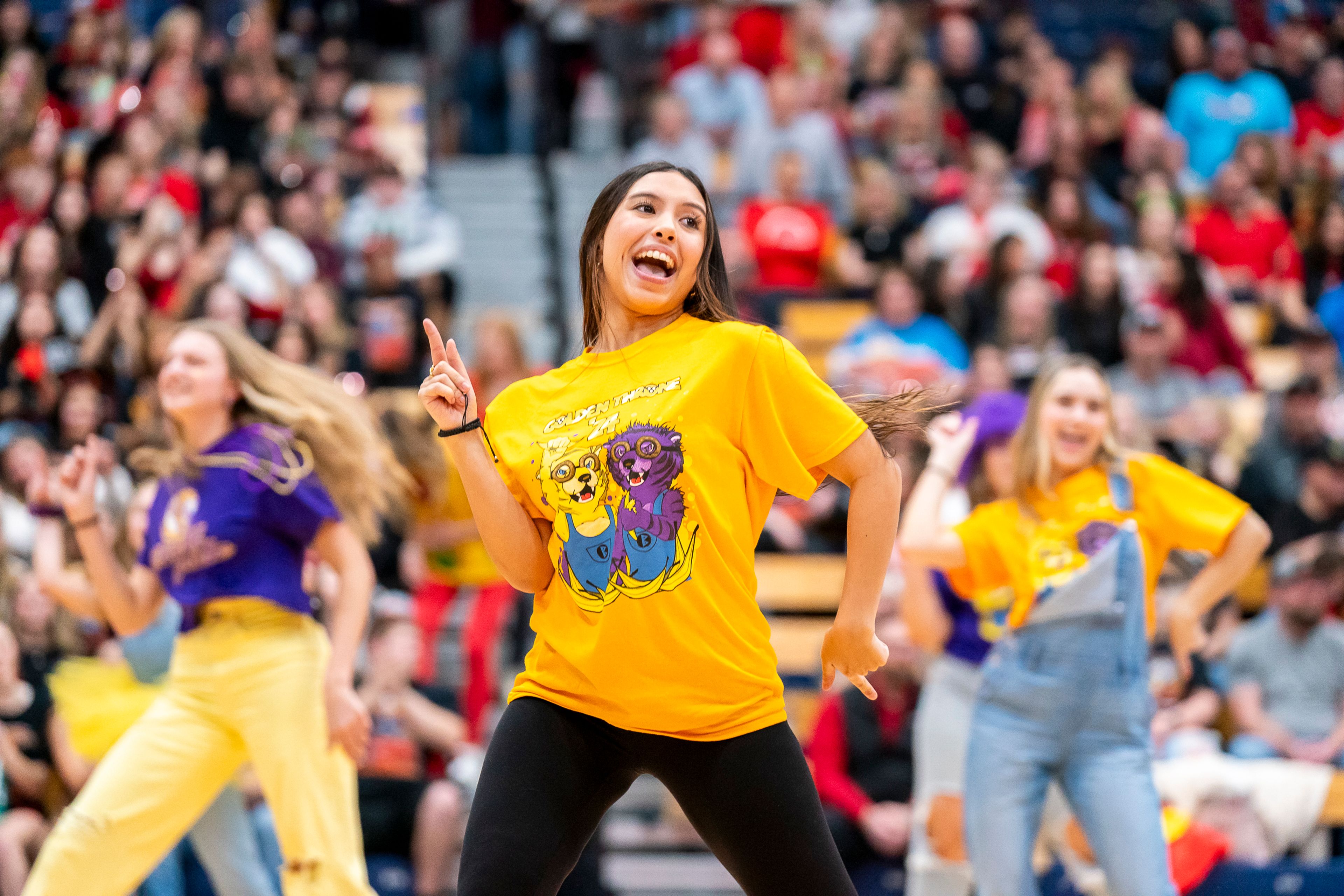 Lewiston High School students dance during halftime of the men’s basketball Golden Throne rivalry game against Clarkston on Friday inside the P1FCU Activity Center in Lewiston.