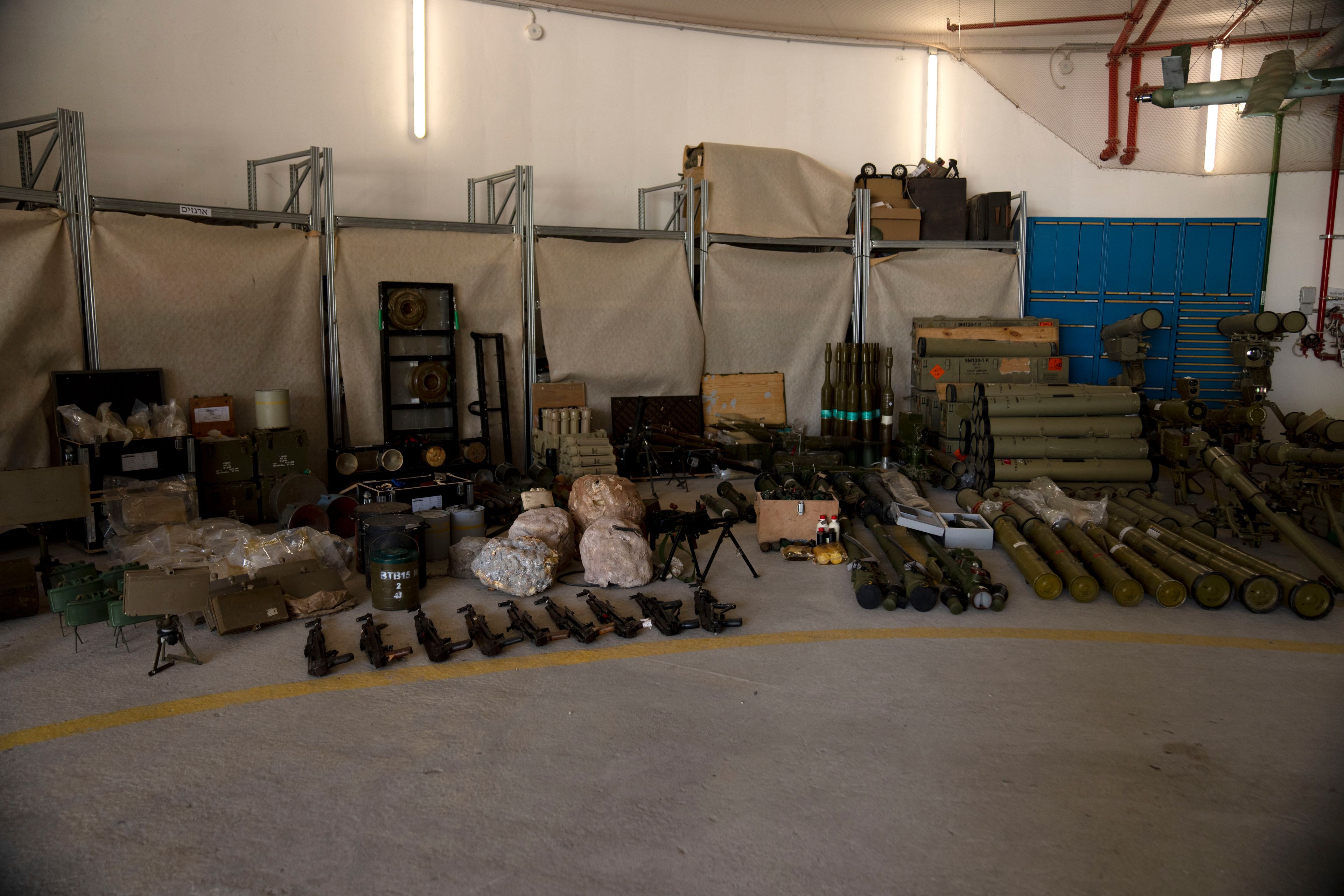 Weapons used by Hezbollah seized during combat operations in Lebanon are displayed during a government-organized media tour on a base in southern Israel, Wednesday, Oct. 9, 2024. (AP Photo/Maya Alleruzzo)