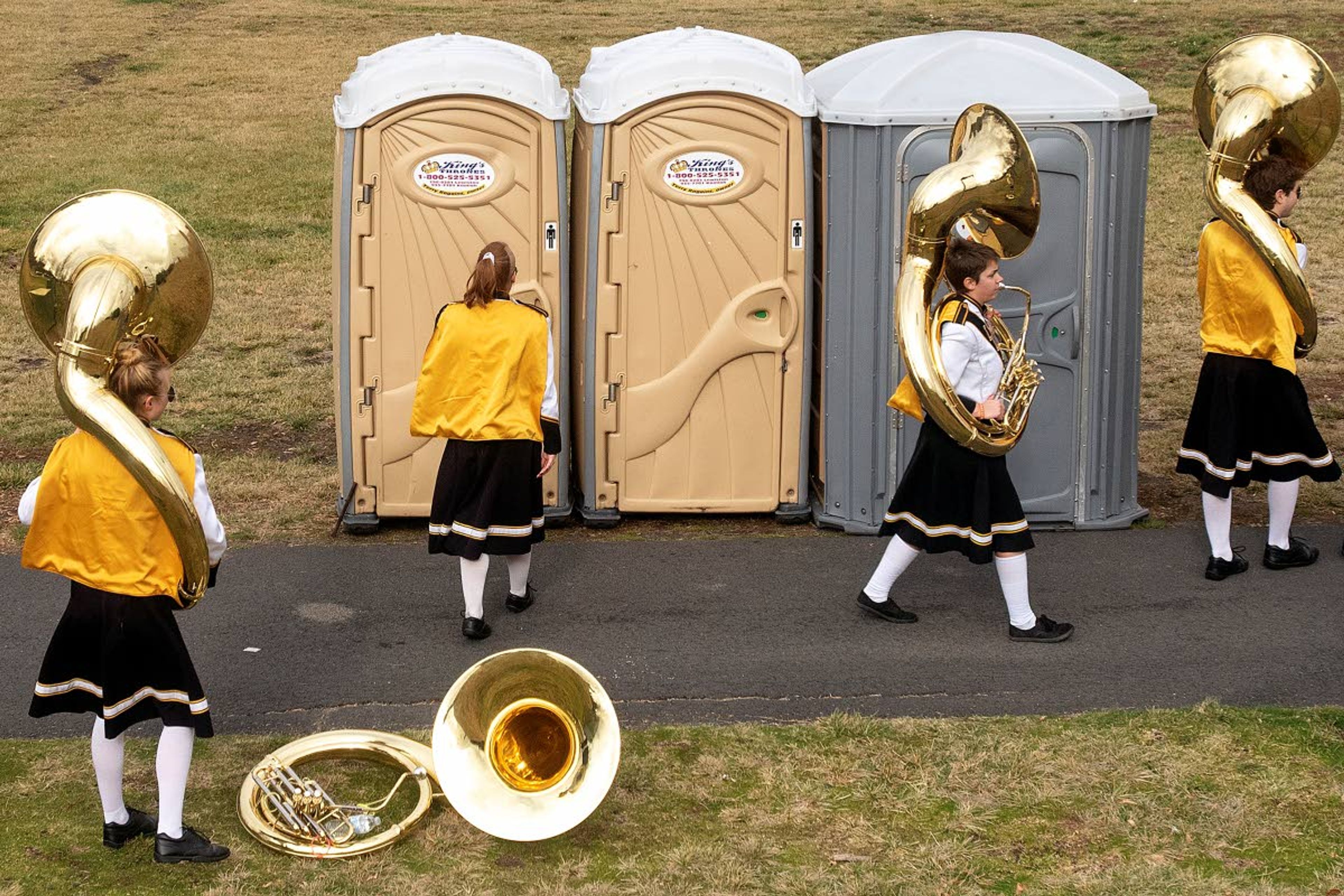 Vandal sousaphone players take a quick break before meeting up with the rest of the marching band prior to kickoff of Idaho's Big Sky game against North Dakota on Saturday, Nov. 3, in Moscow.