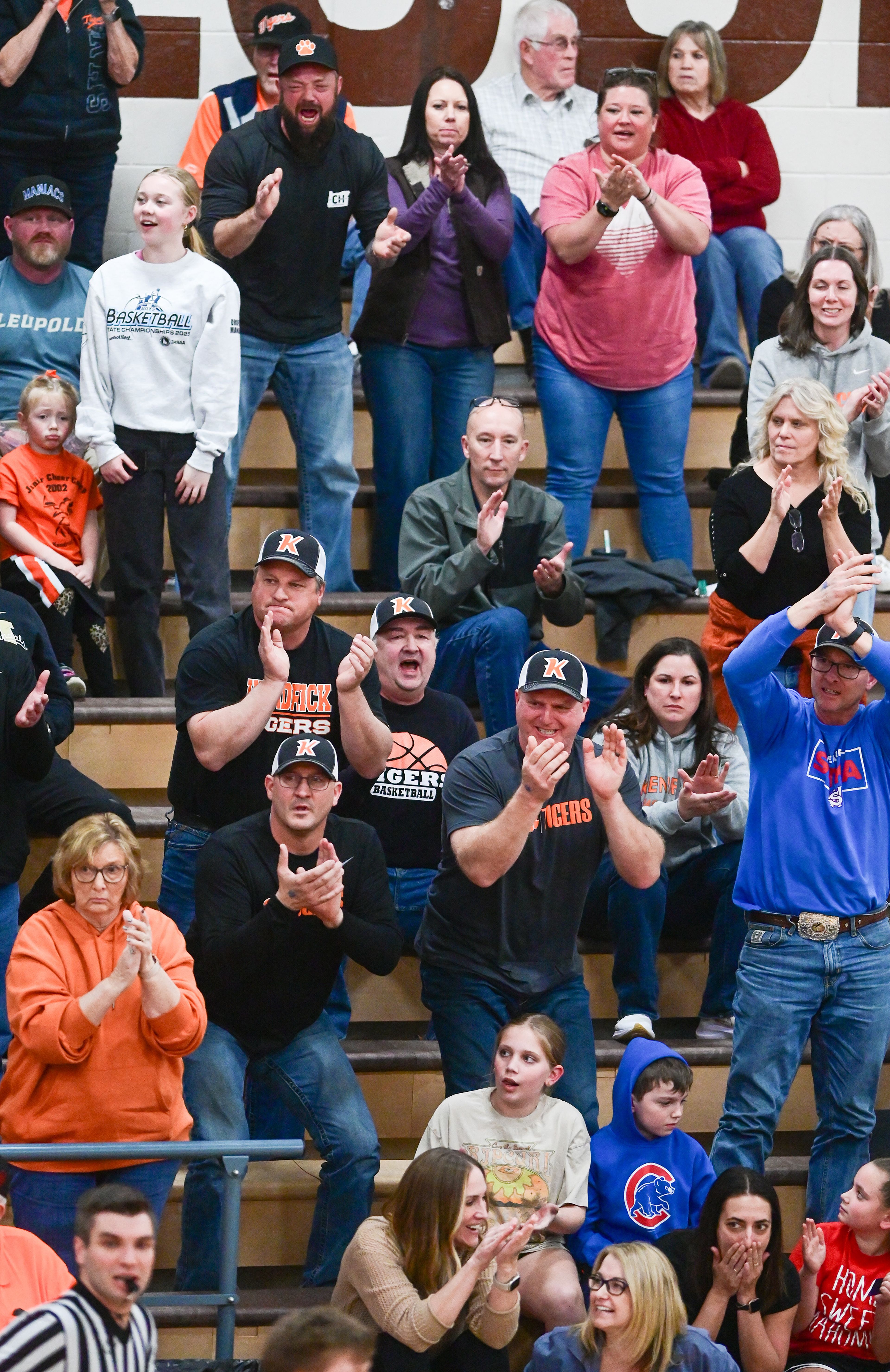Kendrick fans cheer from the stands as the Tigers play Grace at the Idaho 2A state tournament on Friday in Caldwell, Idaho.