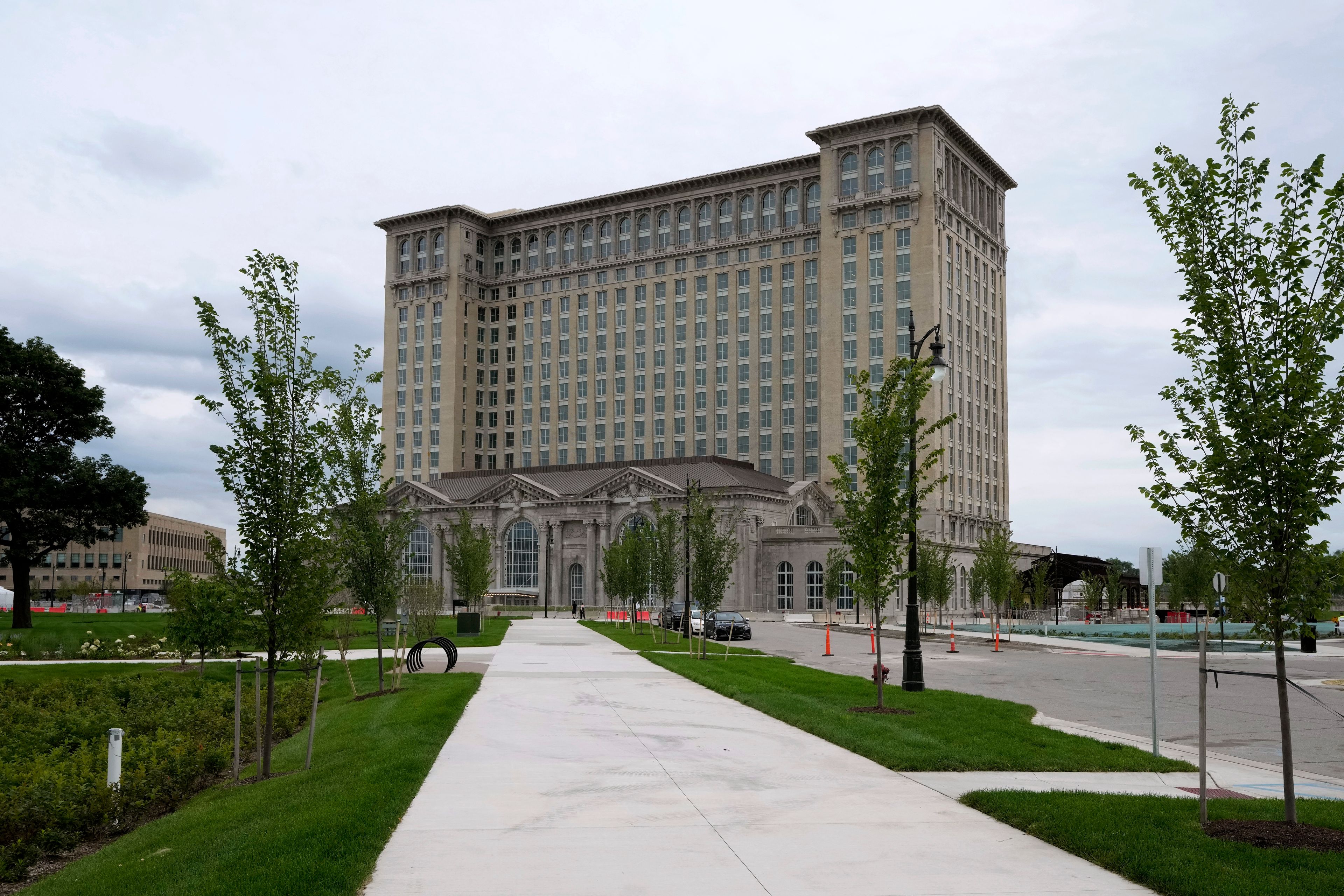 FILE- The exterior of the Michigan Central Station is seen, July 13, 2023 in Detroit. A once hulking scavenger-ravaged monolith that symbolized Detroit's decline reopens this week after a massive six-year multimillion dollar renovation by Ford Motor Co., which restored the Michigan Central Station to its past grandeur with a focus squarely on the future of mobility.