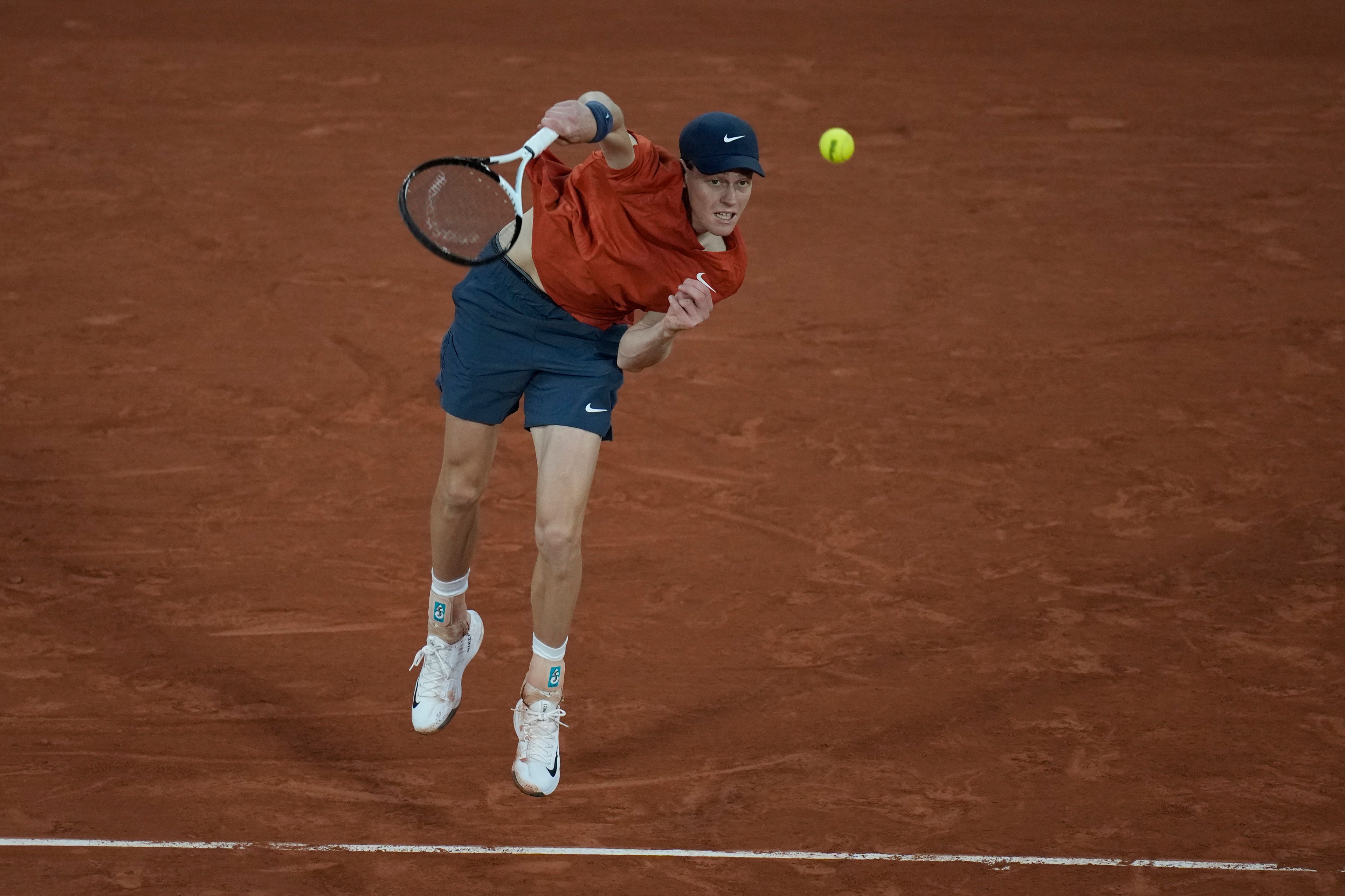 Italy's Jannik Sinner serves against France's Corentin Moutet during their fourth round match of the French Open tennis tournament at the Roland Garros stadium in Paris, Sunday, June 2, 2024.