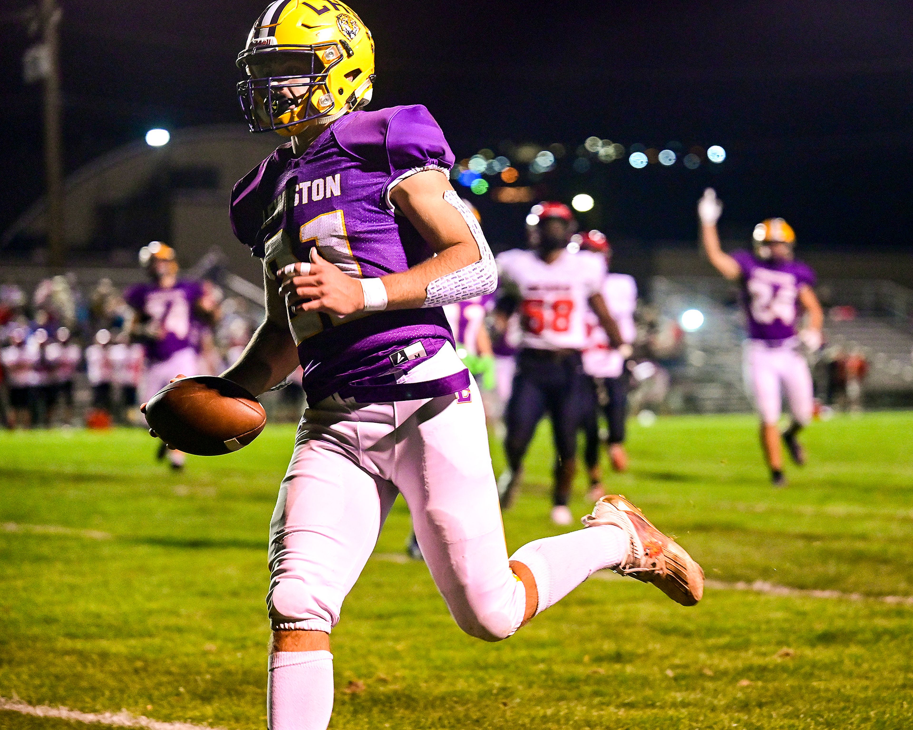 Former Lewiston football player Cruz Hepburn jogs into the end zone for a touchdown in the third quarter of a game against Moscow on Oct. 1, 2021, at Bengal Field in Lewiston.