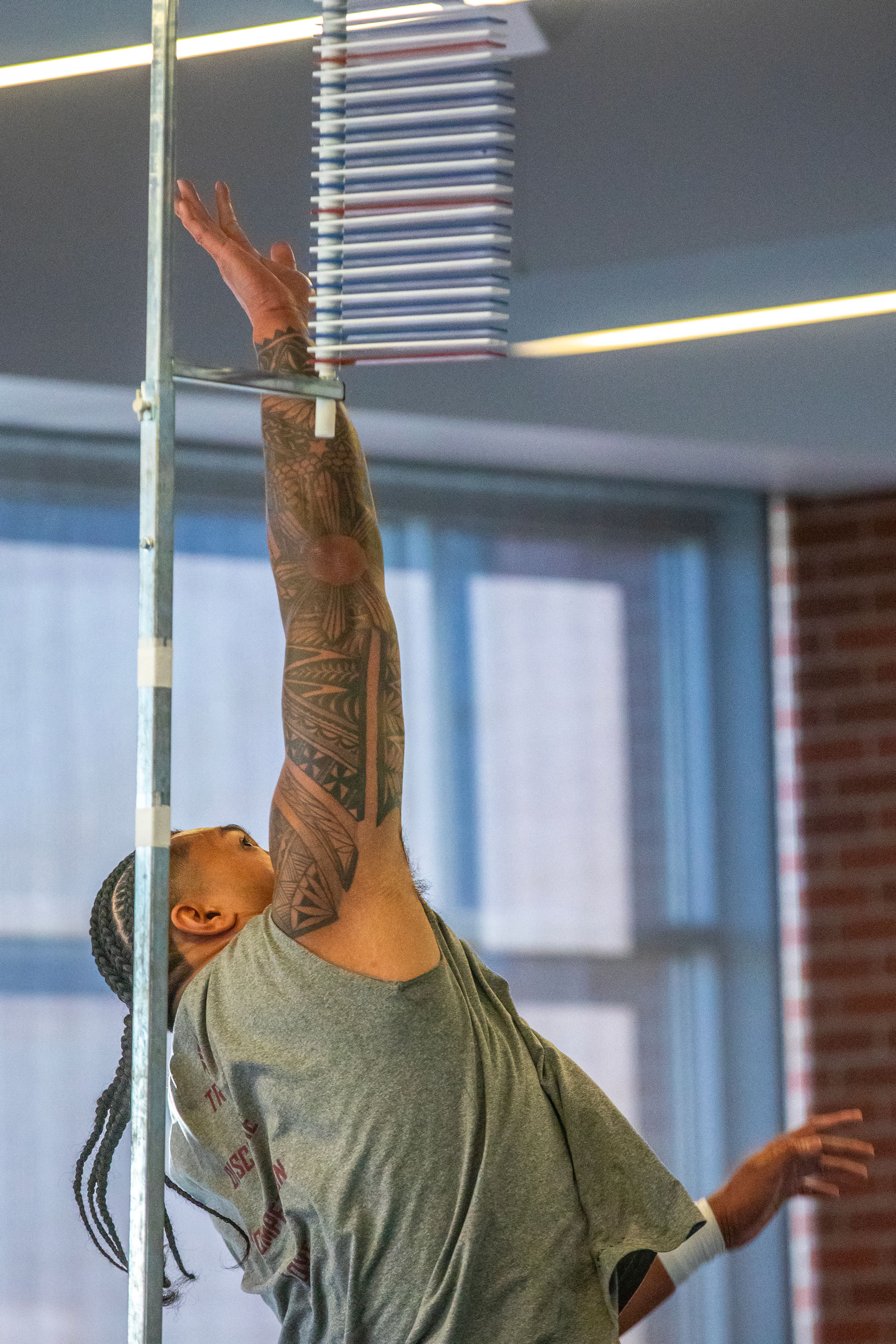 Washington State edge Nusi Malani leaps up in the vertical jump test during WSU's Pro Day on Friday in Pullman.