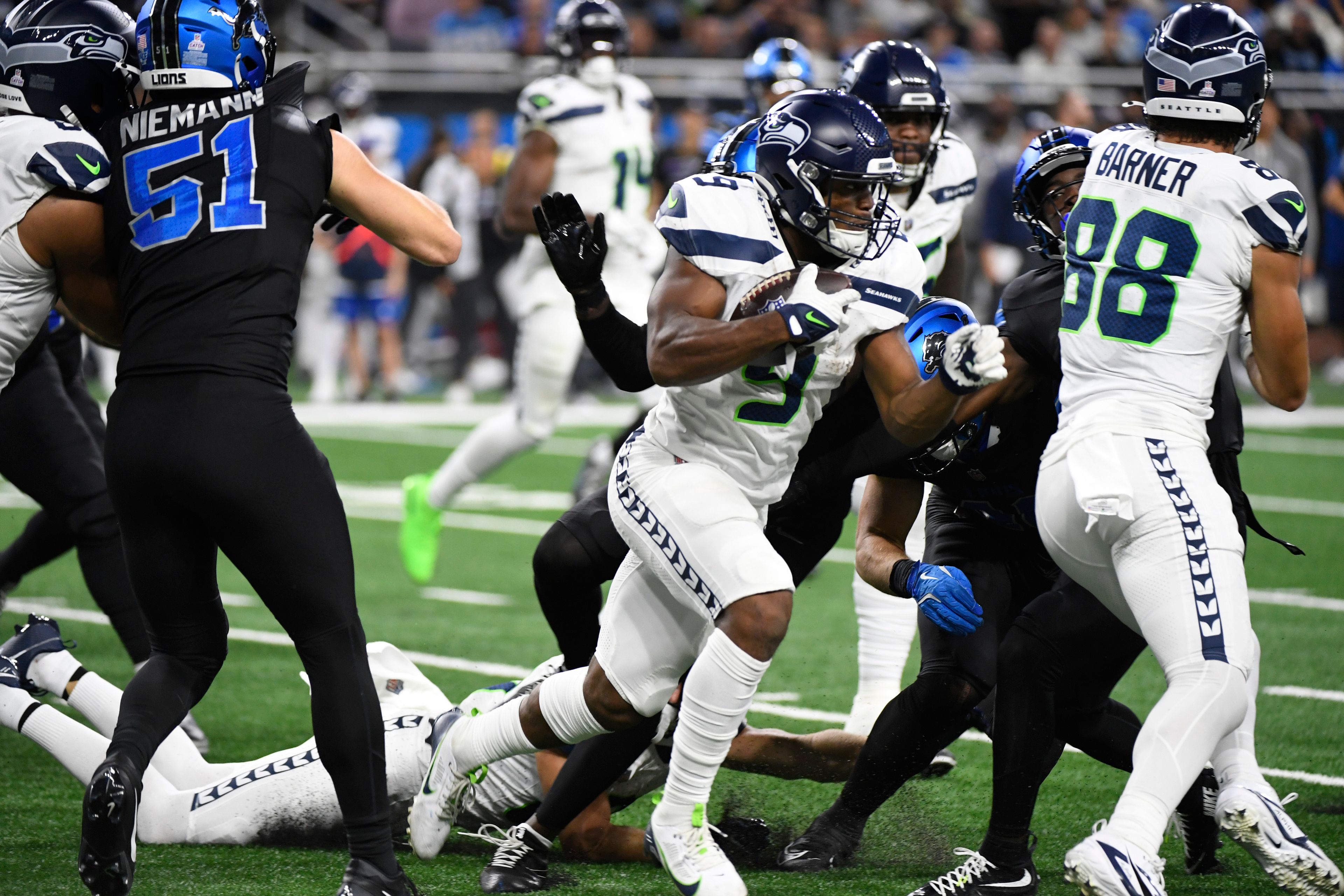 Seattle Seahawks running back Kenneth Walker III (9) rushes during the second half of an NFL football game against the Detroit Lions, Monday, Sept. 30, 2024, in Detroit. (AP Photo/Jose Juarez)