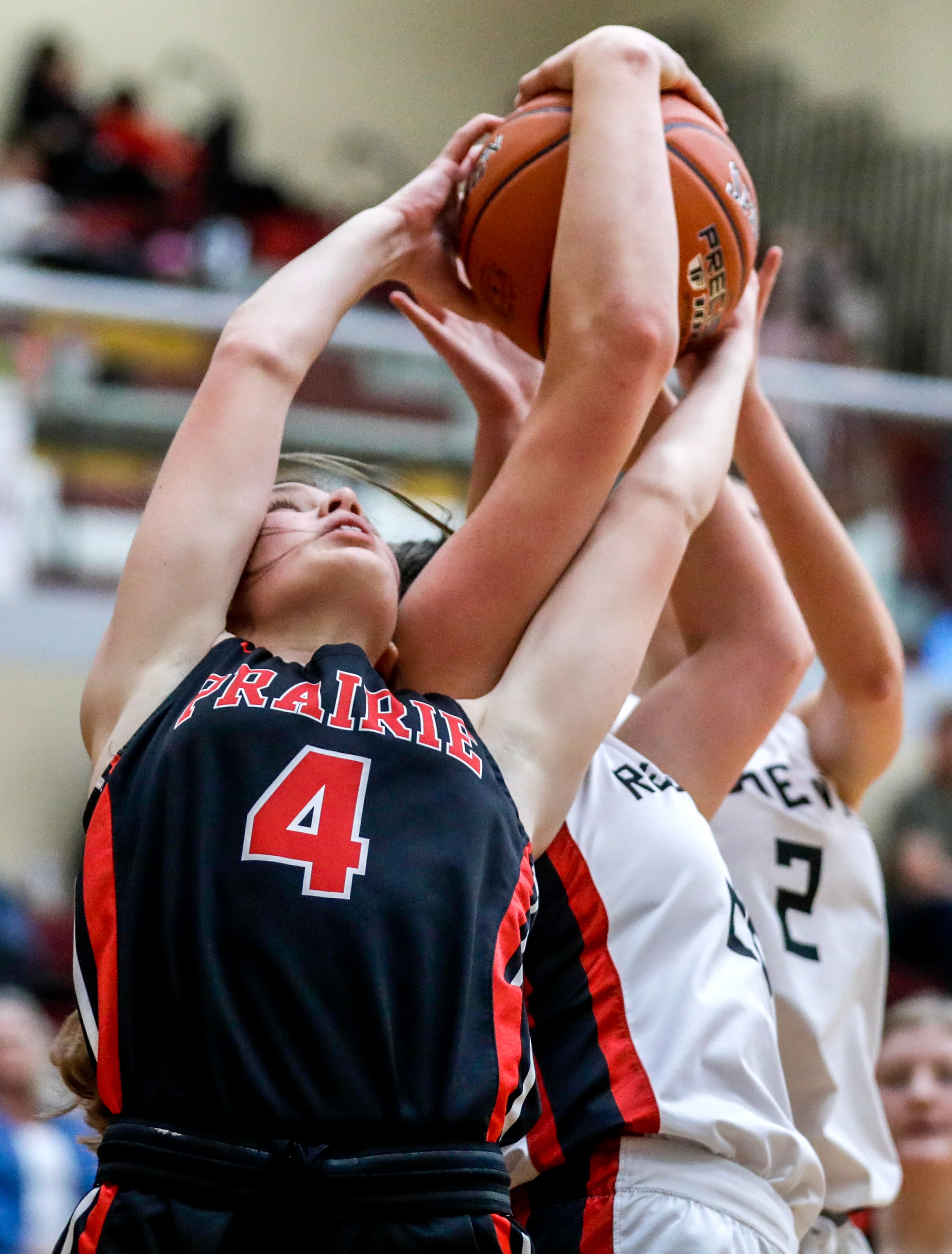 Prairie guard Sydney Shears wrestles for a rebound with Murtaugh center Courtney Jensen during a quarterfinal game in the girls 1A DI state tournament Thursday at Columbia High School in Nampa.