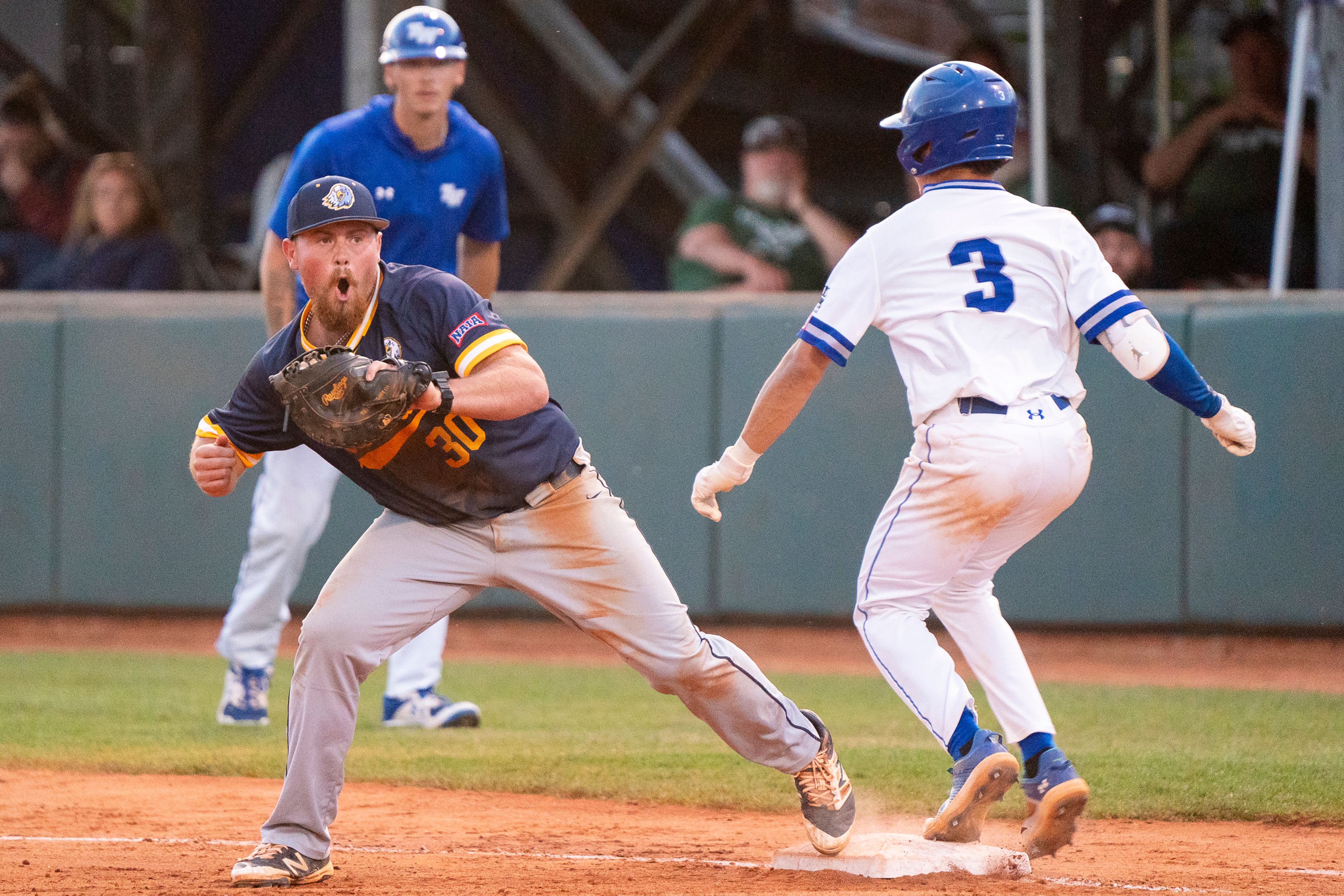 Reinhardt first baseman Nash Crowell (30) celebrates after getting an out during Game 18 of the NAIA World Series against Tennessee Wesleyan on Thursday at Harris Field in Lewiston.