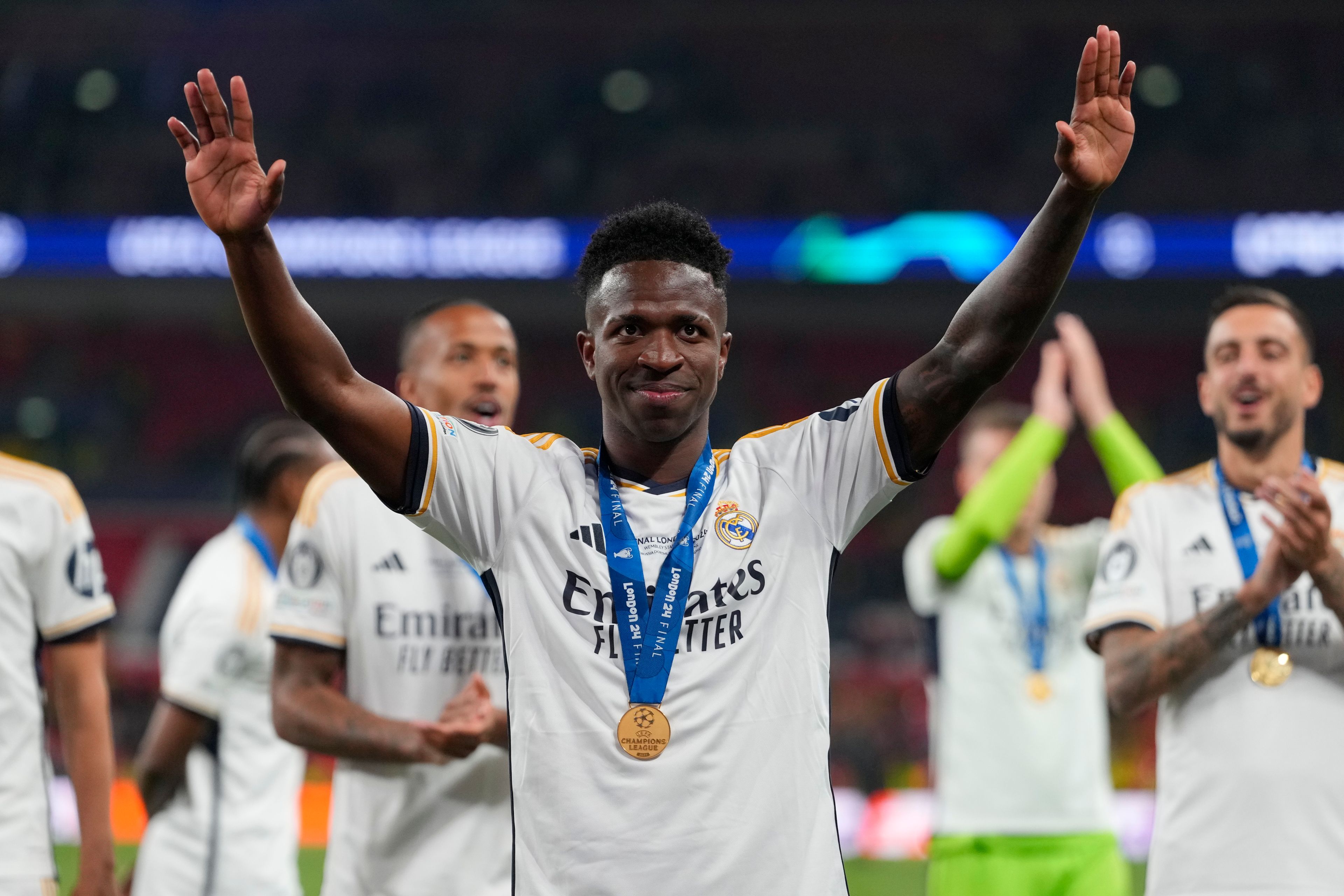 Real Madrid's Vinicius Junior waves after winning the Champions League final soccer match between Borussia Dortmund and Real Madrid at Wembley stadium in London, Saturday, June 1, 2024.