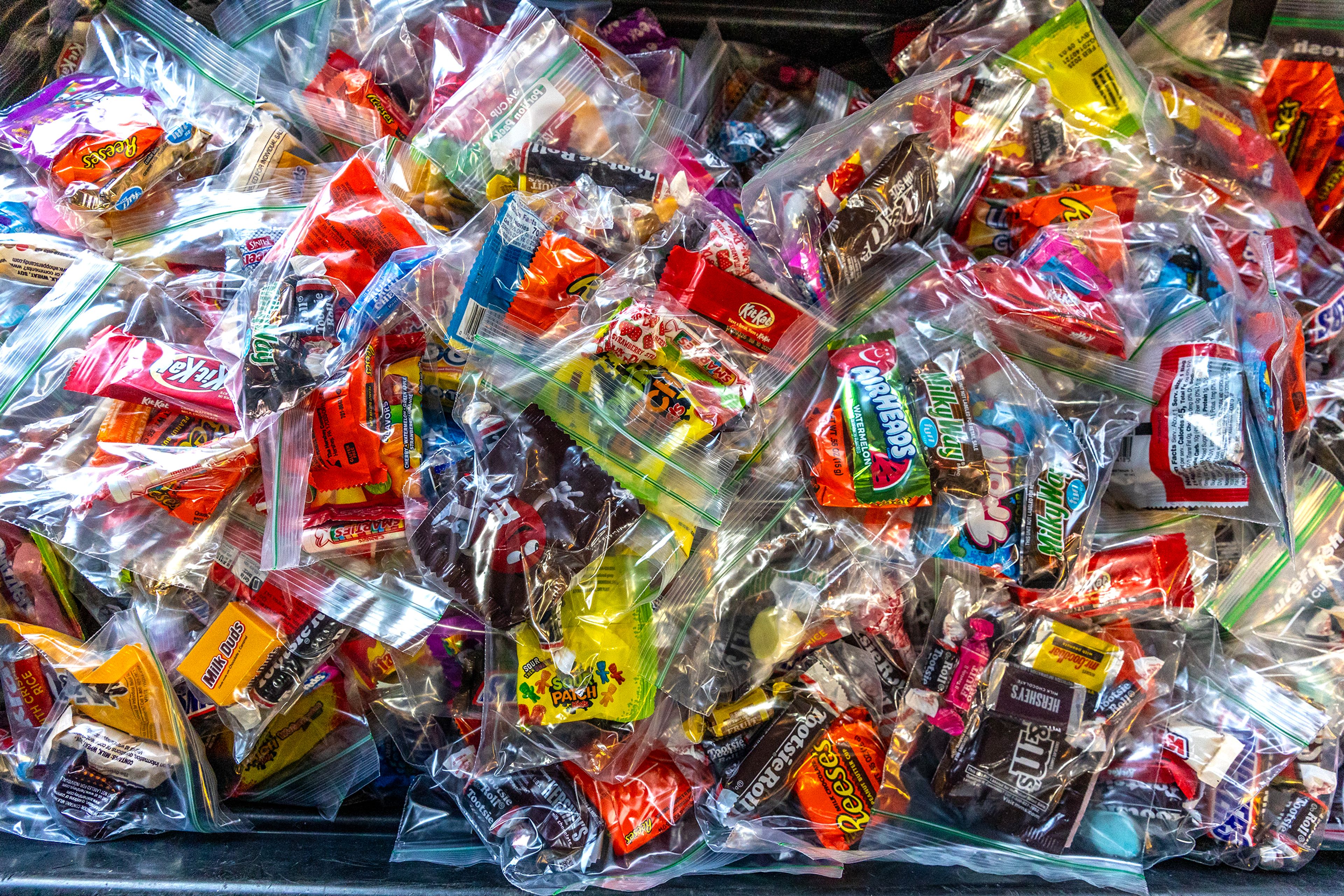 A tub of candy waits for trick-or-treaters to arrive Thursday in the Sunset Drive neighborhood in Lewiston.