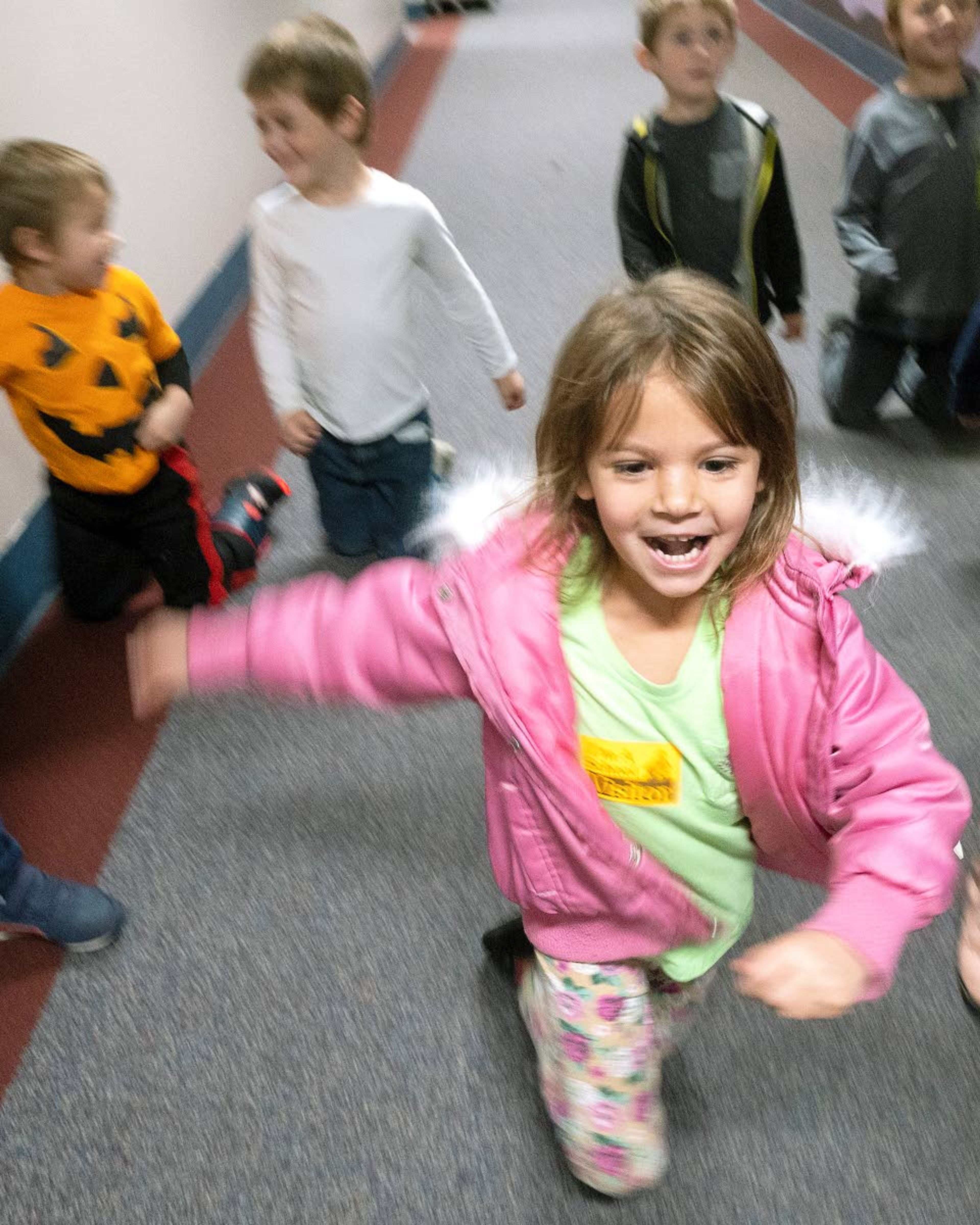 Walking through the halls is for adults. Walking on your knees through the hallways is how it's done when you’re young, as demonstrated by Ayanna Schilt last week at Grantham Elementary in Clarkston.