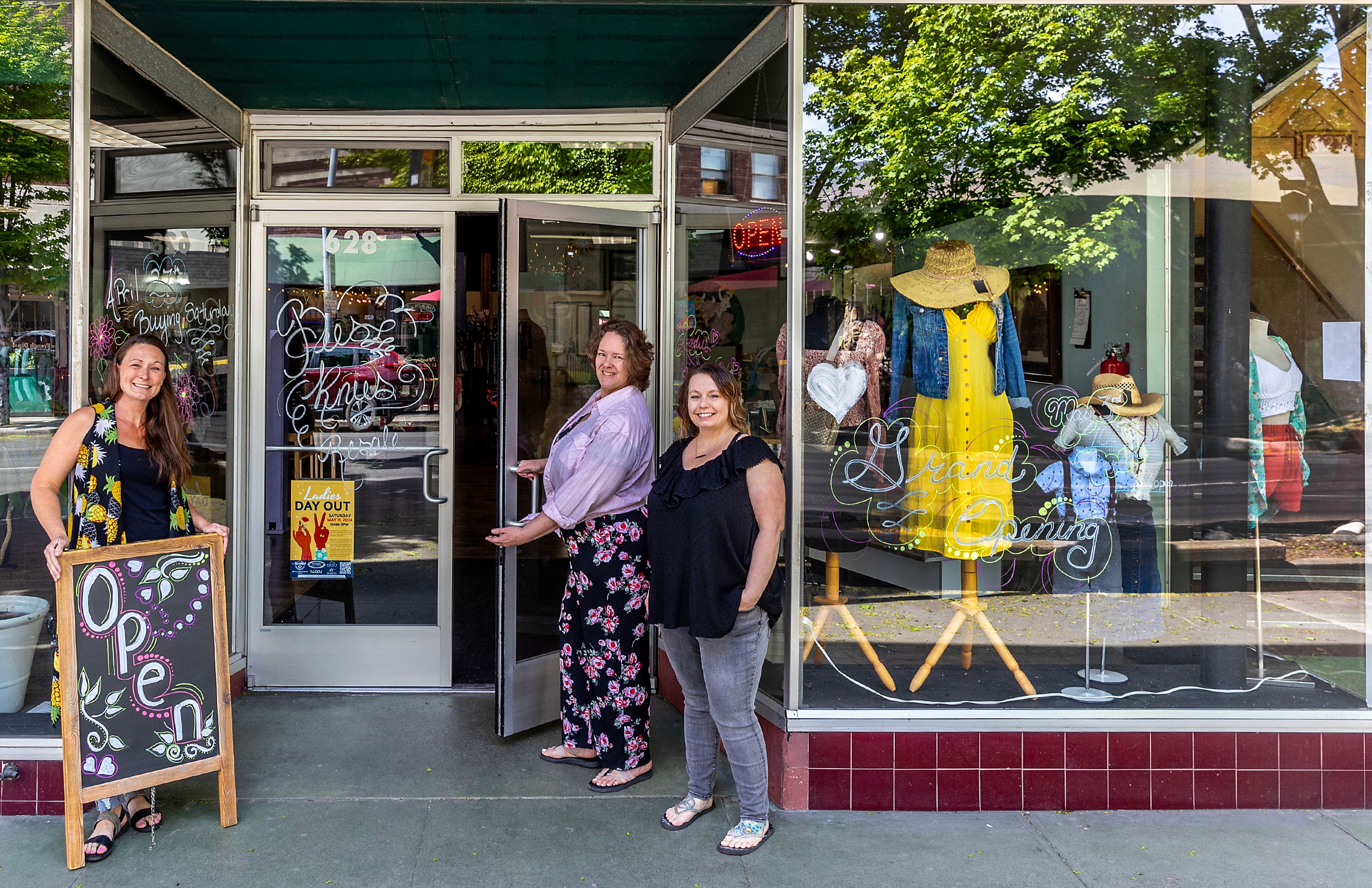 Bethany Peterson, from left, Nicole Moss and Nola Cullum stand in front of their store Bee’s Knees Resale for a portrait Thursday on Main Street in Lewiston.