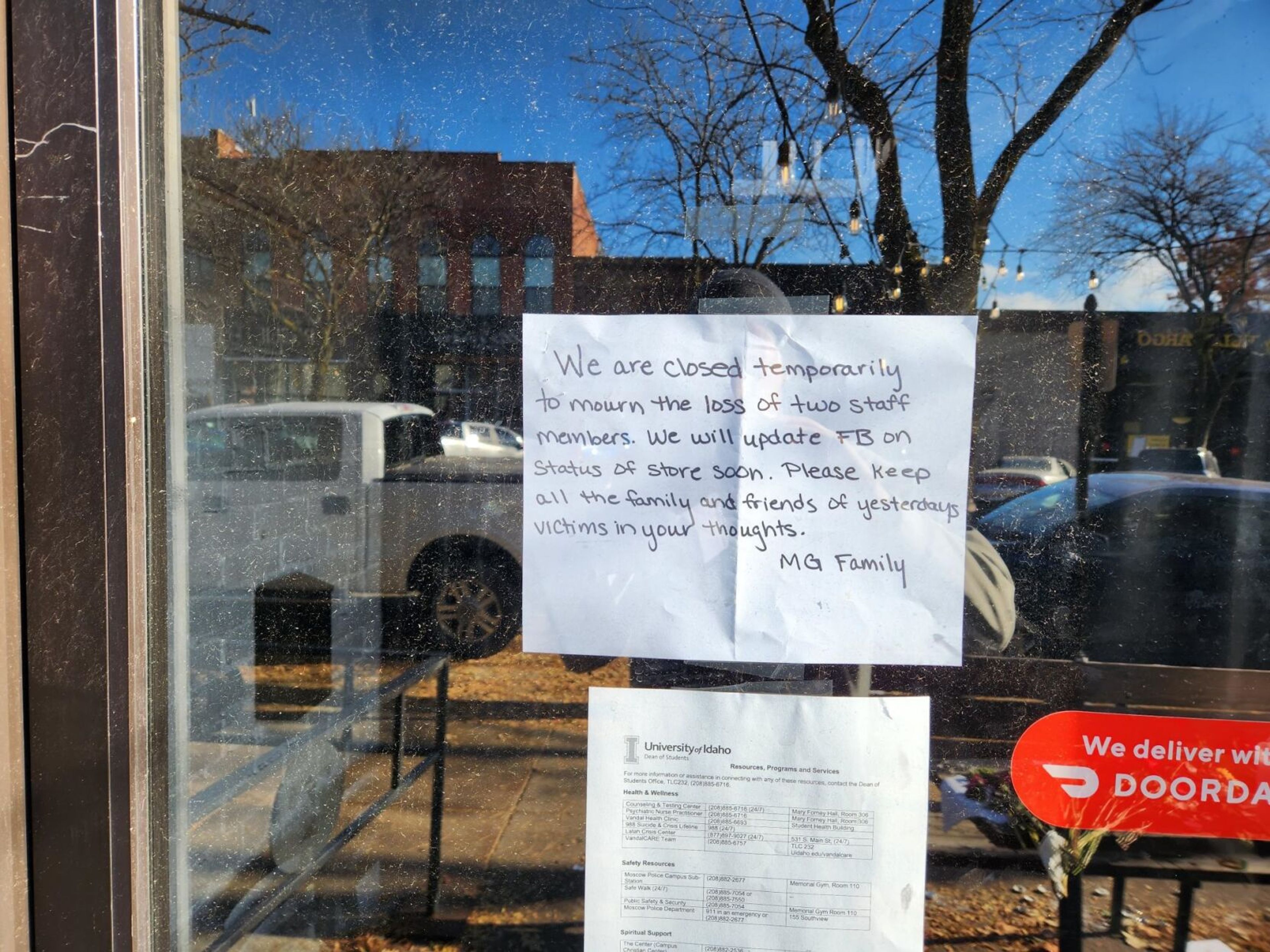 A sign at the Mad Greek restaurant in Moscow refers to two of the victims, who worked at the restaurant.