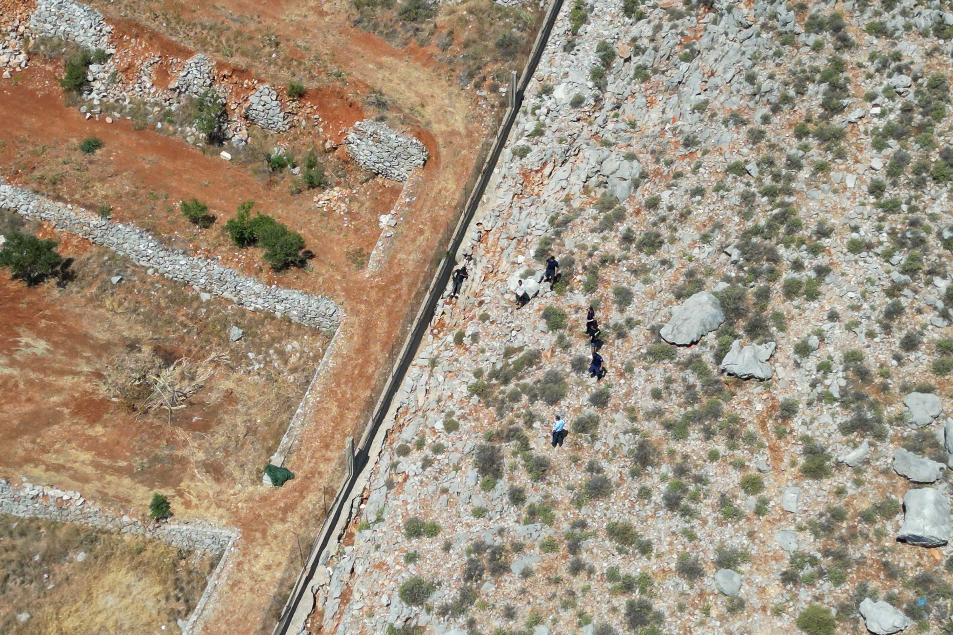 The body of missing British TV presenter Michael Mosley lies on a rocky area on the island of Symi, Sunday, June 9, 2024. The family of missing British TV presenter Dr. Michael Mosley have confirmed his body has been found on a Greek island. Mosley’s wife said Sunday in a statement that her husband had gone for a hike and took the wrong route and collapsed in a place where his body couldn’t easily be seen.