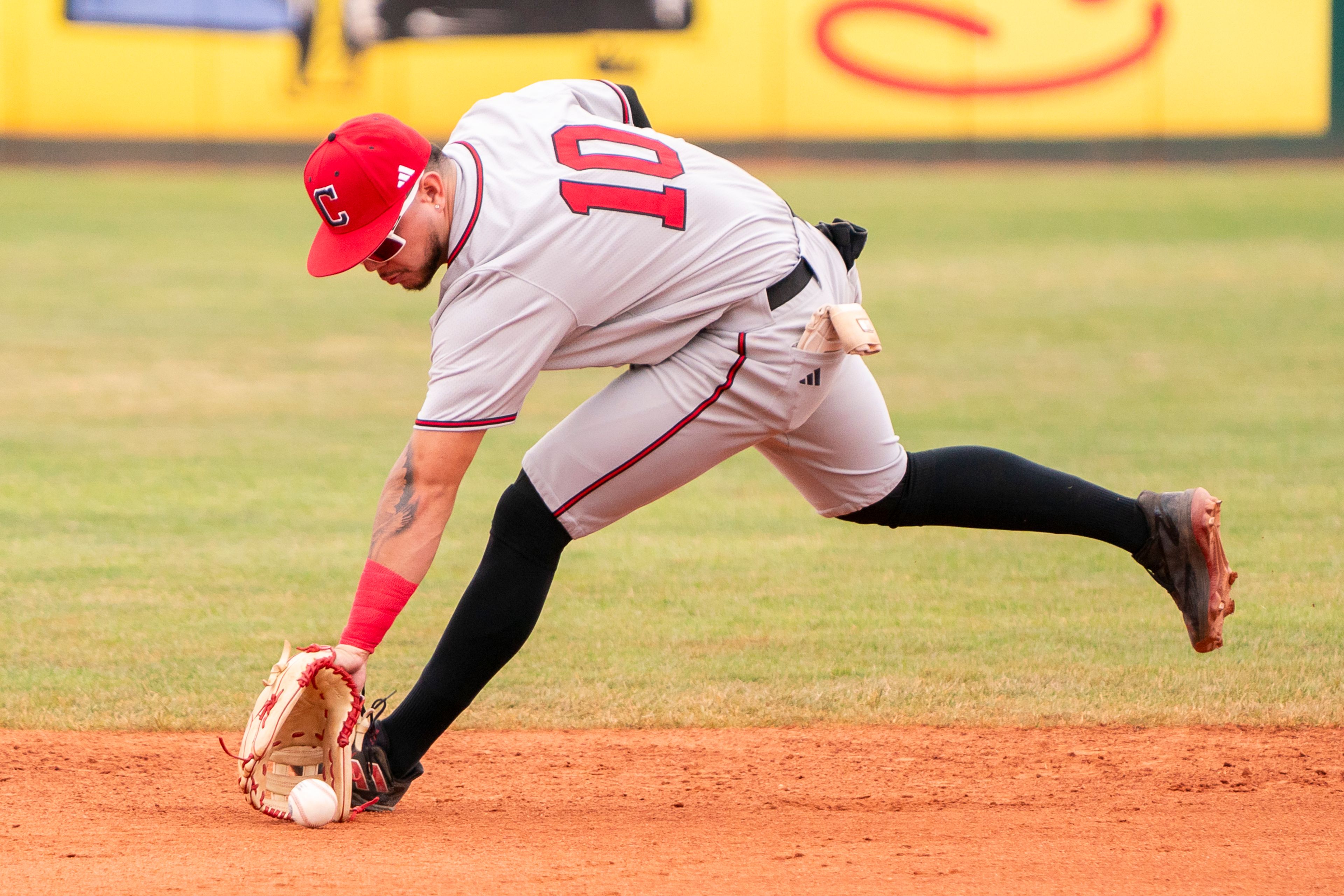 William Carey second baseman Rigoberto Hernandez fields a ground ball during game 6 of the NAIA World Series against Cumberlands on Saturday at Harris Field in Lewiston.