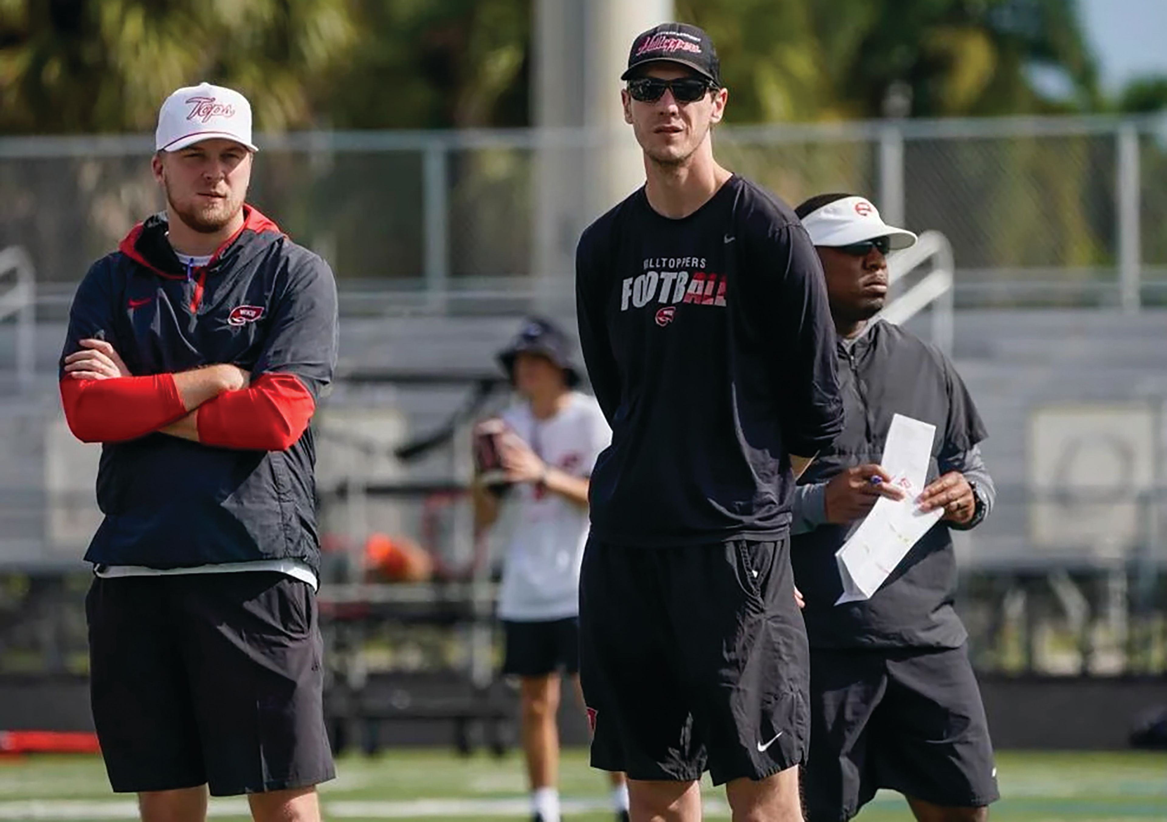 Washington State has hired Ben Arbuckle, left, as its next offensive coordinator. Arbuckle led Western Kentucky’s offense this season.