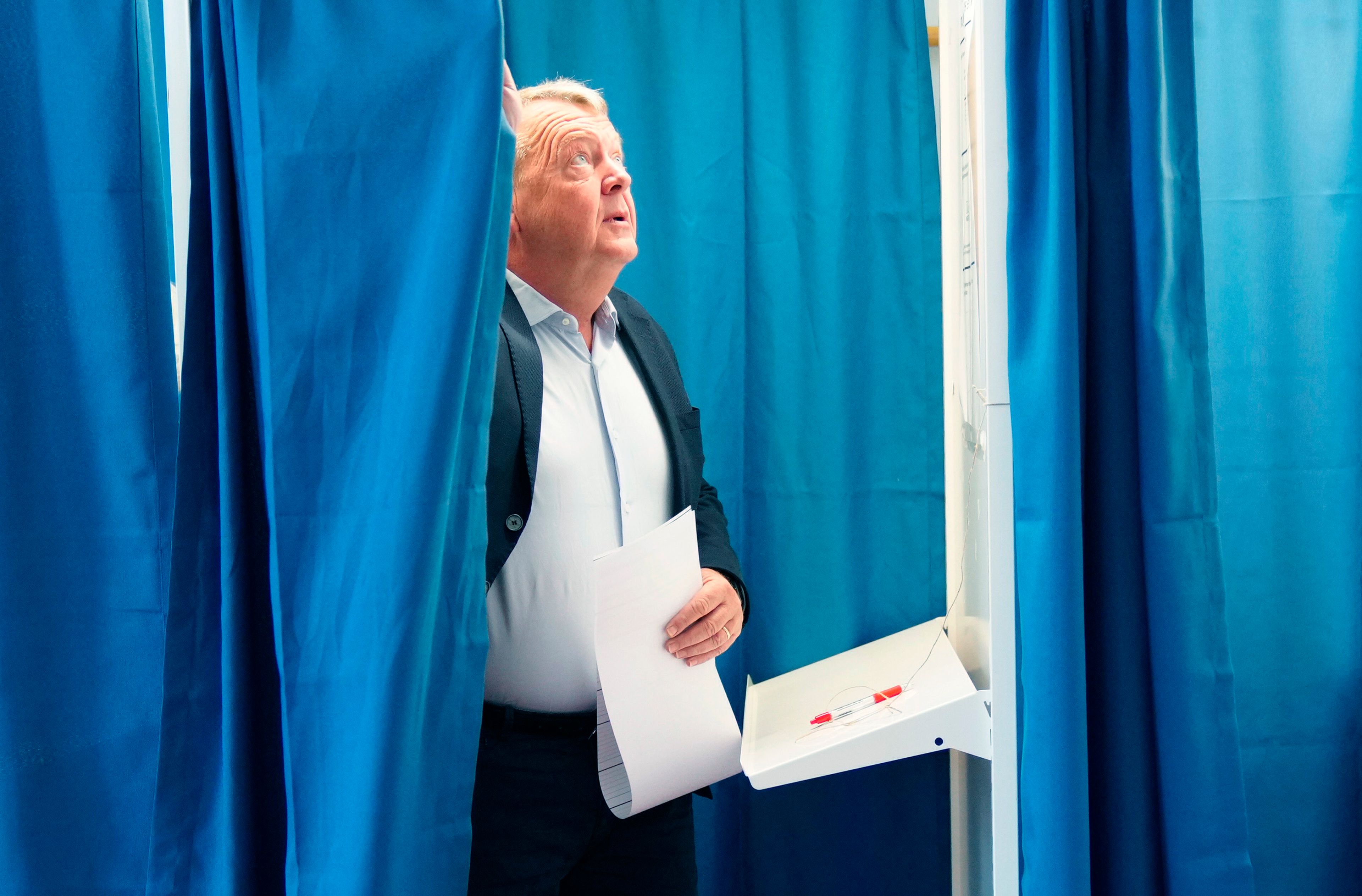 Denmark's Foreign Minister Lars Loekke Rasmussen, of The Moderates party cast his vote at Nyboder School, in Copenhagen, Denmark, Sunday, June 9, 2024. Polling stations have opened across Europe as voters from 20 countries cast ballots in elections that are expected to shift the European Union’s parliament to the right and could reshape the future direction of the world’s biggest trading bloc.