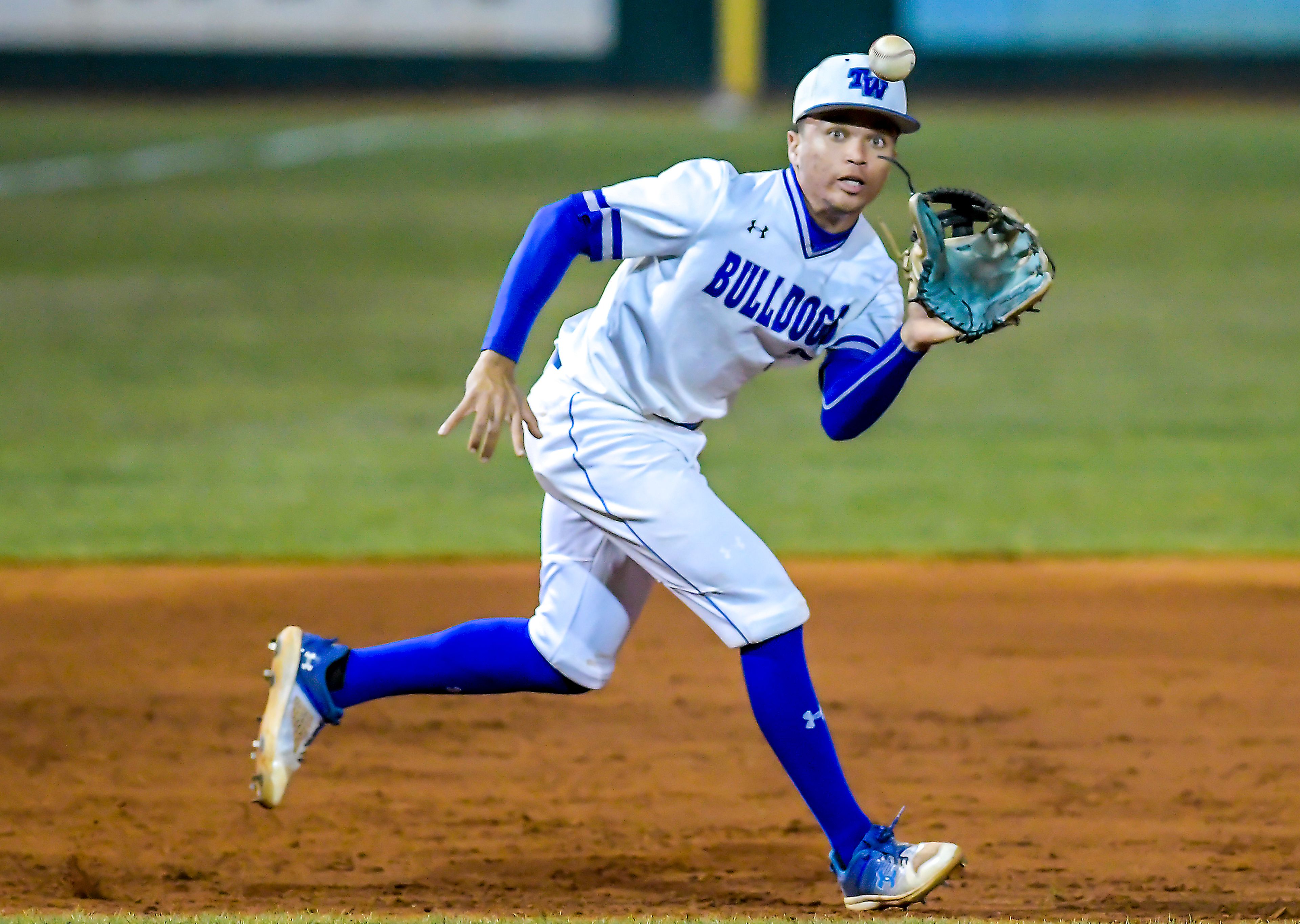 Tennessee Wesleyan third baseman Dante Leach makes a catch before throwing to first against Georgia Gwinnett in Game 12 of the NAIA World Series at Harris Field Monday in Lewiston.