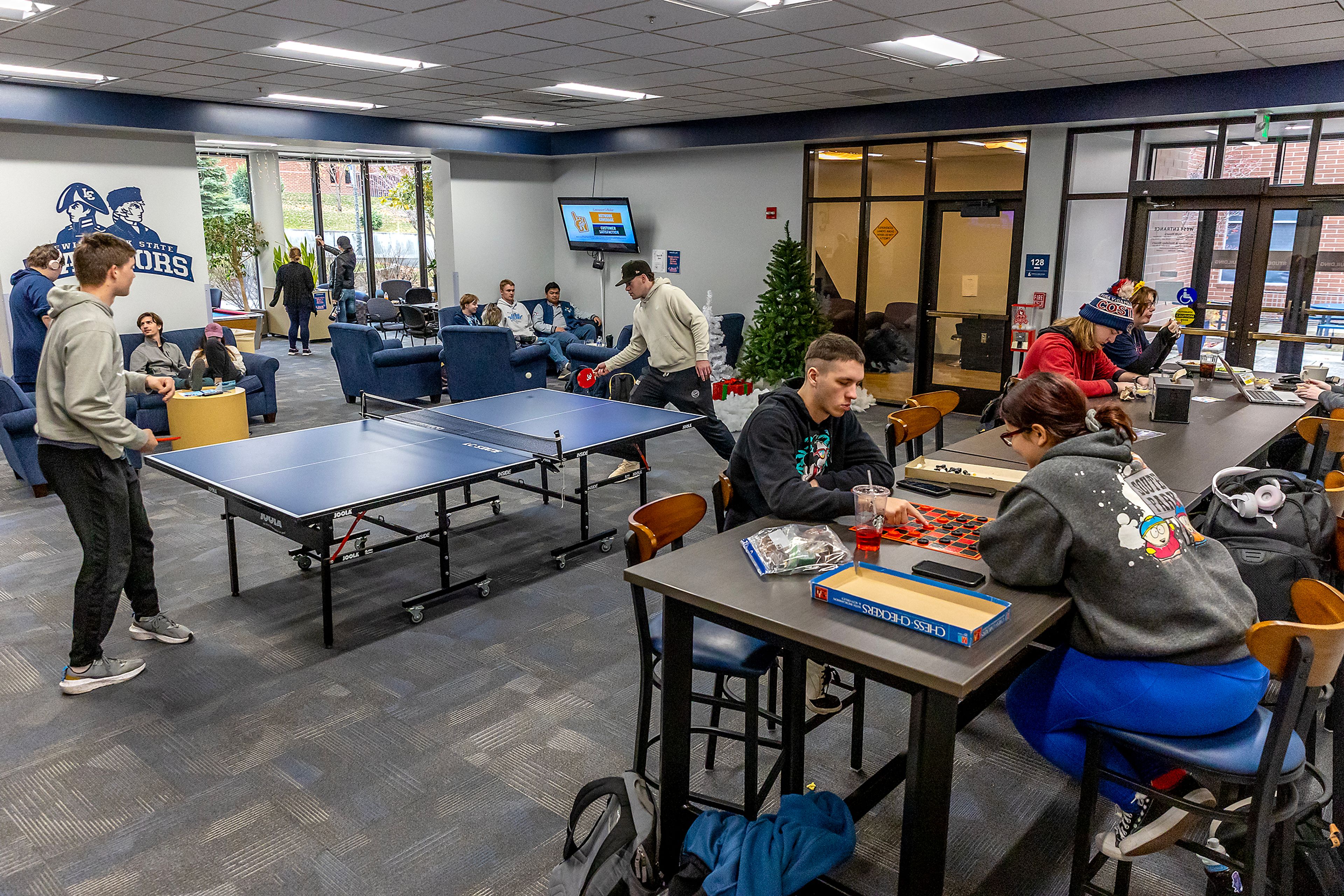 Students play games in the west side of the Student Union Building Wednesday in Lewiston.