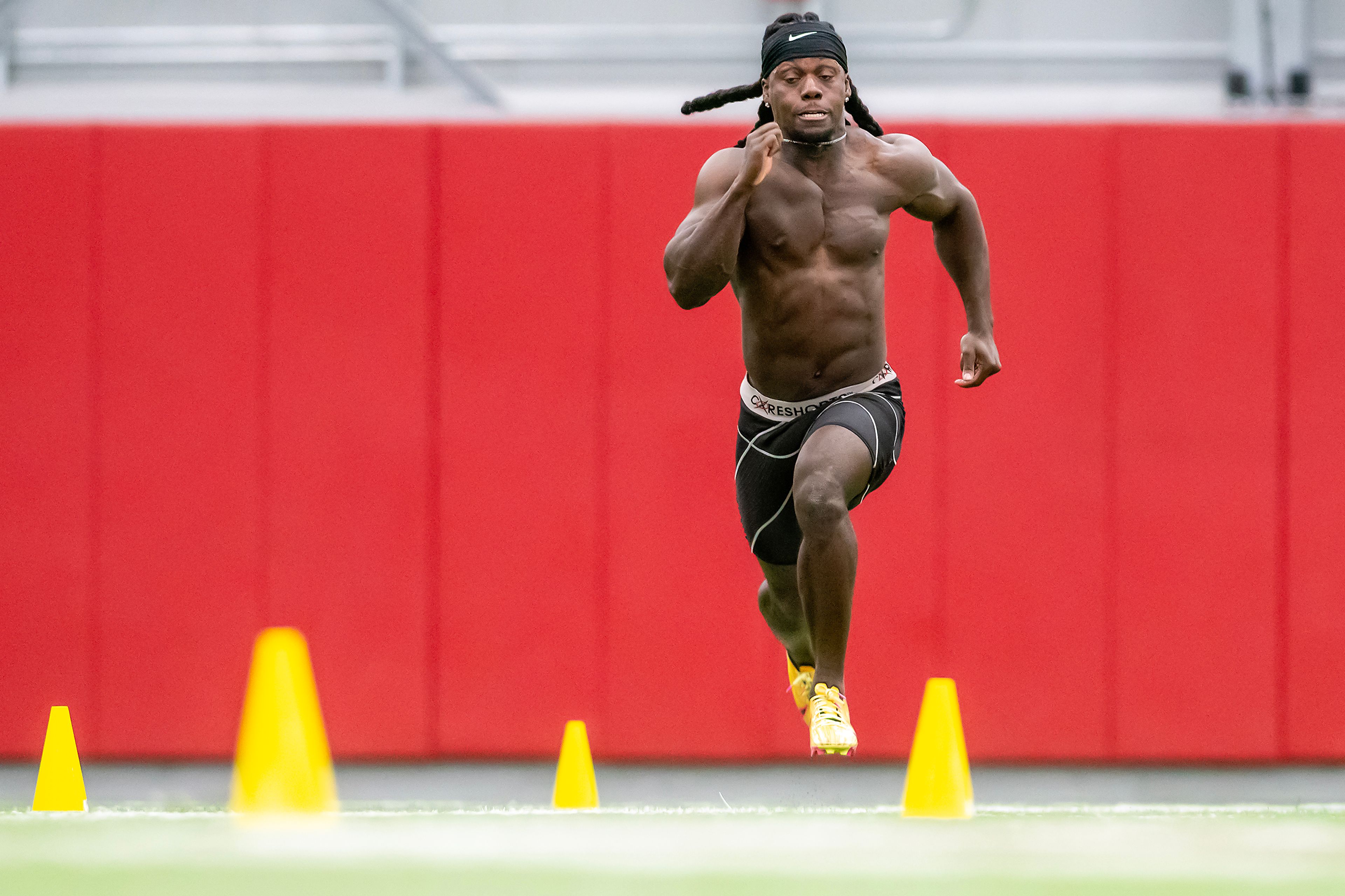 Washington State running back Angel Johnson runs the 40-yard dash during Washington State football’s Pro Day on Monday in Pullman.