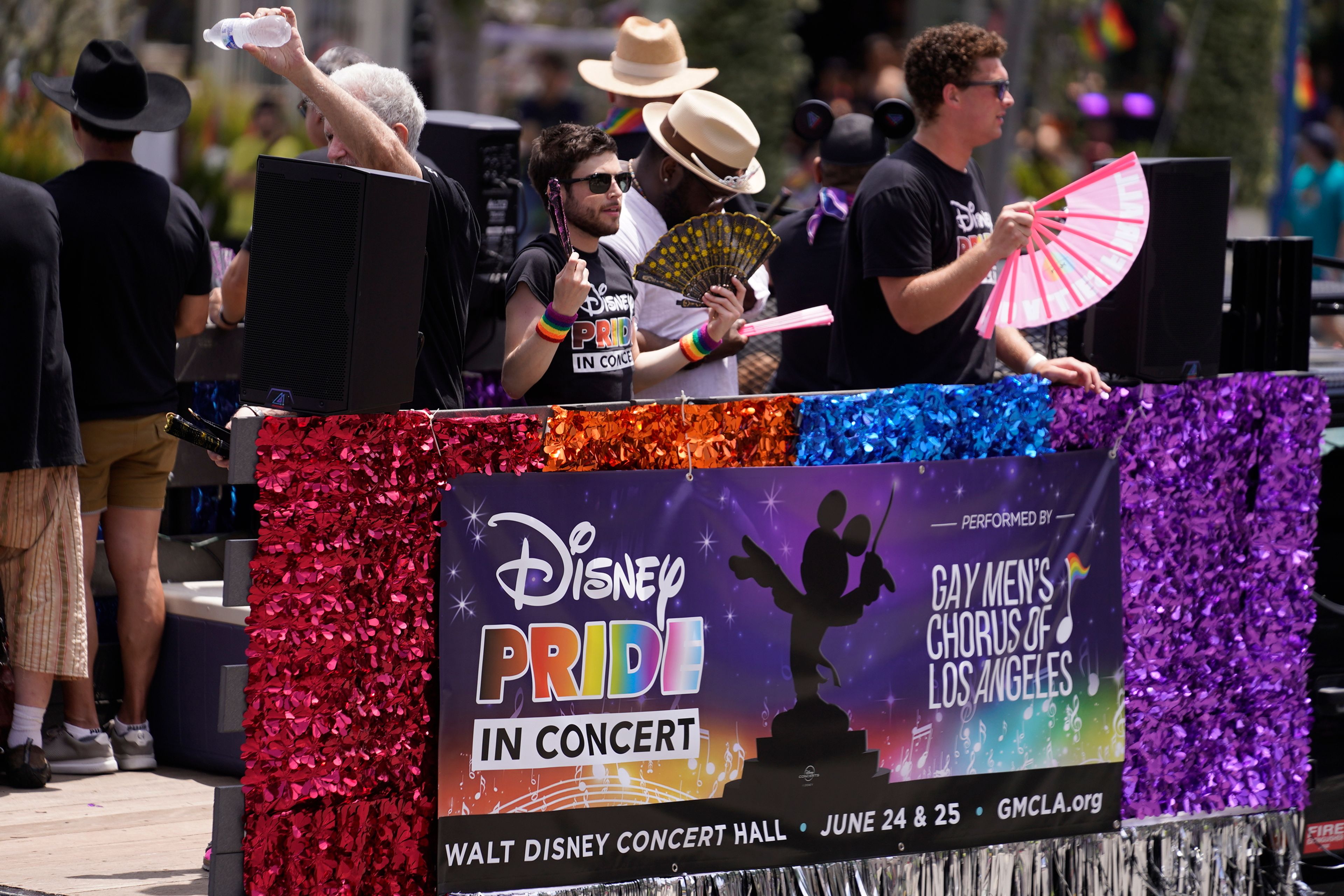 Members of the Gay Men's Chorus of Los Angeles sing as they march at the WeHo Pride Parade in West Hollywood, Calif., on Sunday, June 4, 2023. Some 200 Gay Men's Chorus of Los Angeles members will perform Disney Pride in concert the music of iconic films at Walt Disney Concert Hall next June 24-25. Hall (AP Photo/Damian Dovarganes)