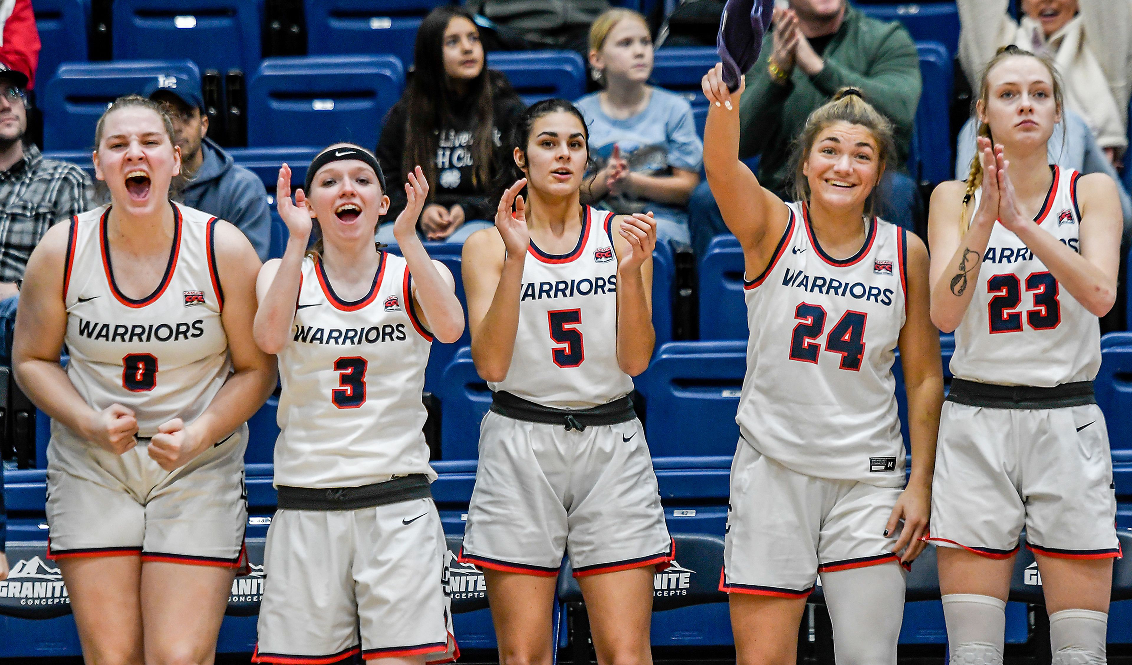 From left, Lewis-Clark State players Lindsey Wilson, Adyson Clabby, Sitara Byrd, Payton Hymas and Mataya Green celebrate a made basket during the 10th-ranked Warriors’ Cascade Conference victory Saturday against Southern Oregon at the P1FCU Activity Center.