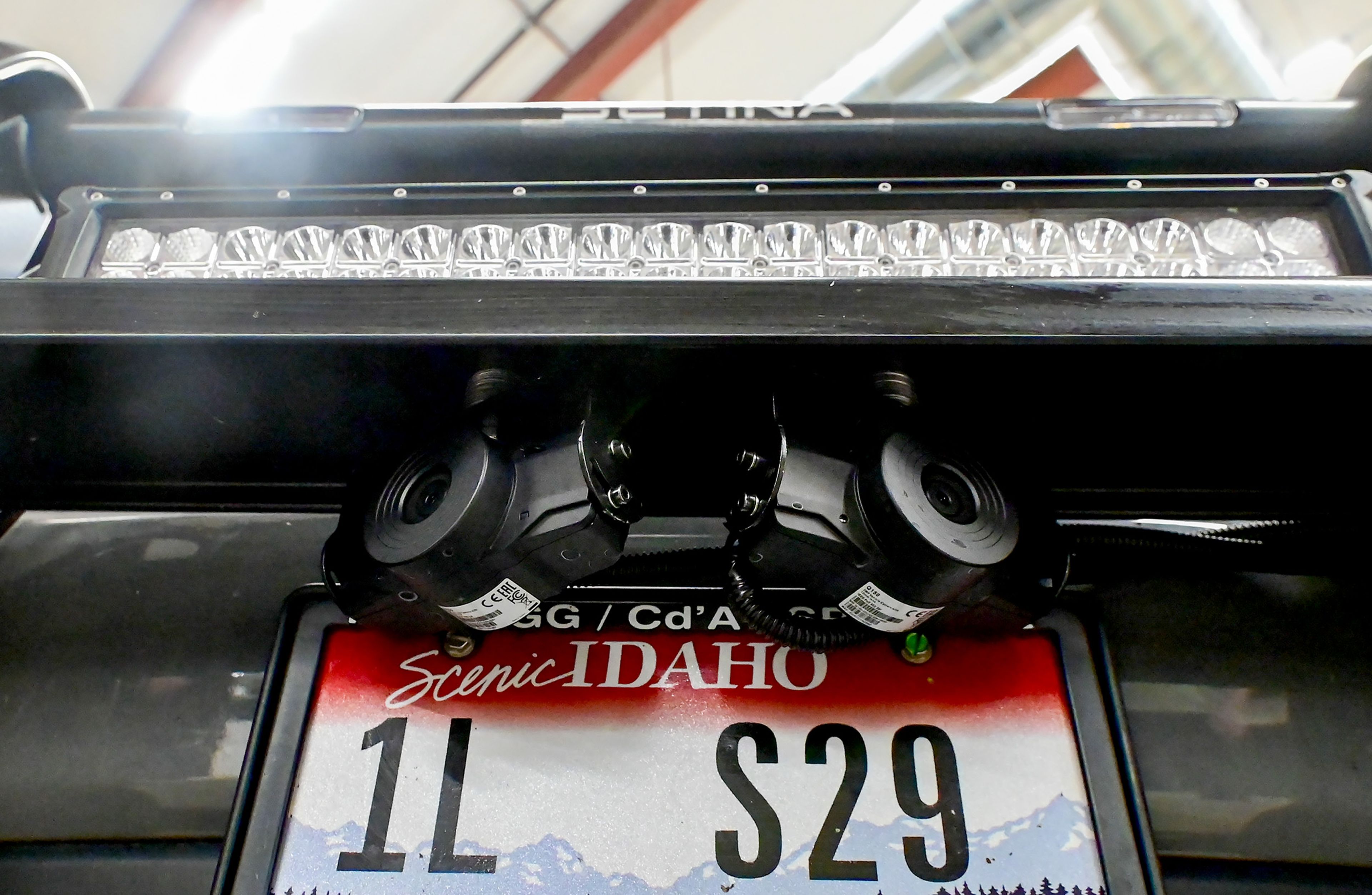 Cameras equipped on three Latah County Sheriff’s Office patrol cars are able to scan traffic in neighboring lanes for license plate information, as shown to the media at the Latah County Fairgrounds on Thursday.